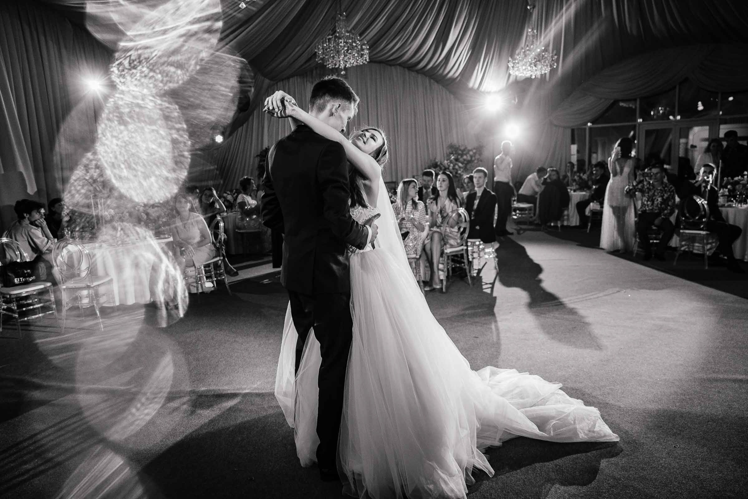 Couple’s final dance floor embrace, by Tanya Bodgan, Bude wedding photography.