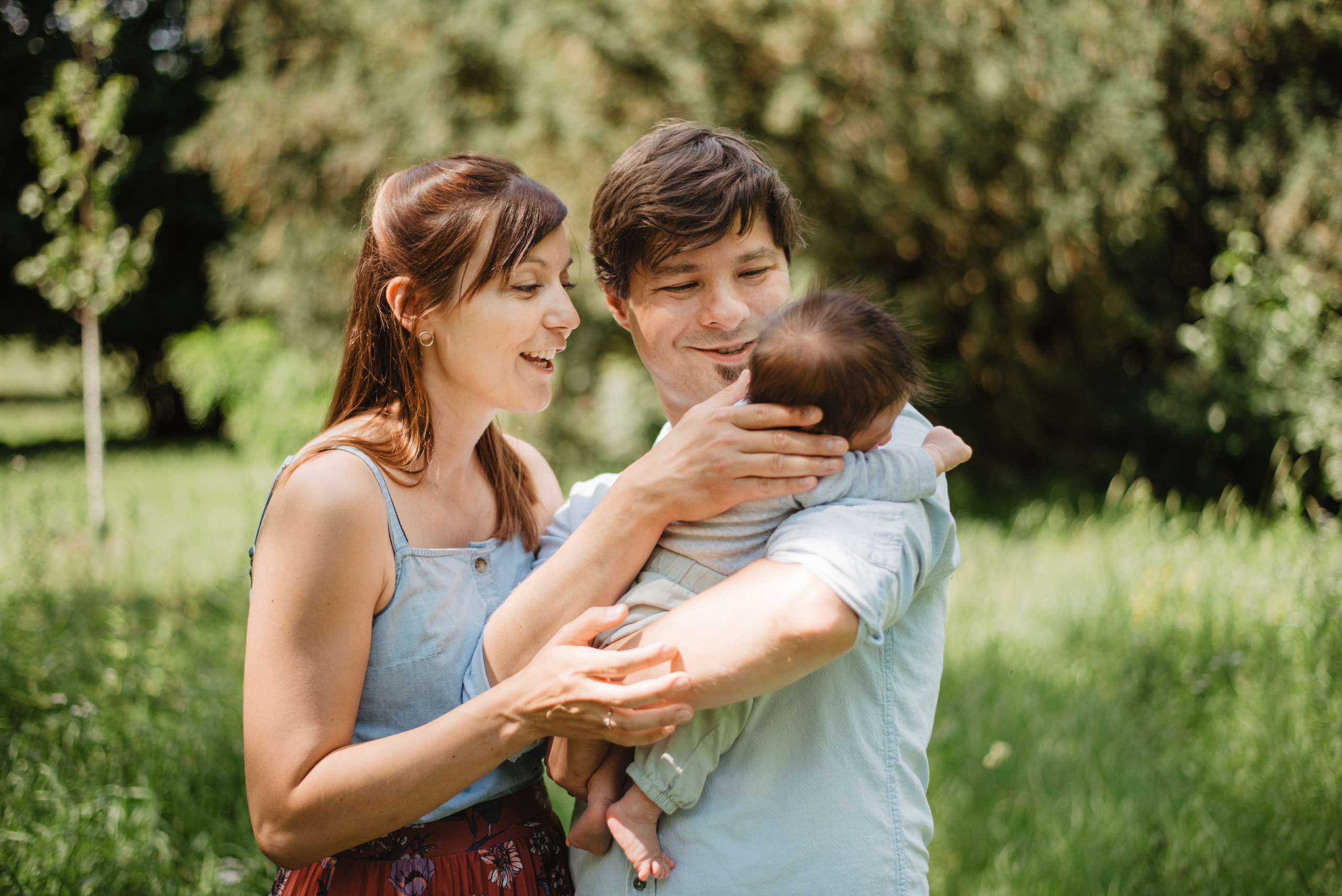 Family photography in park. Lifestyle, wedding and family photographer