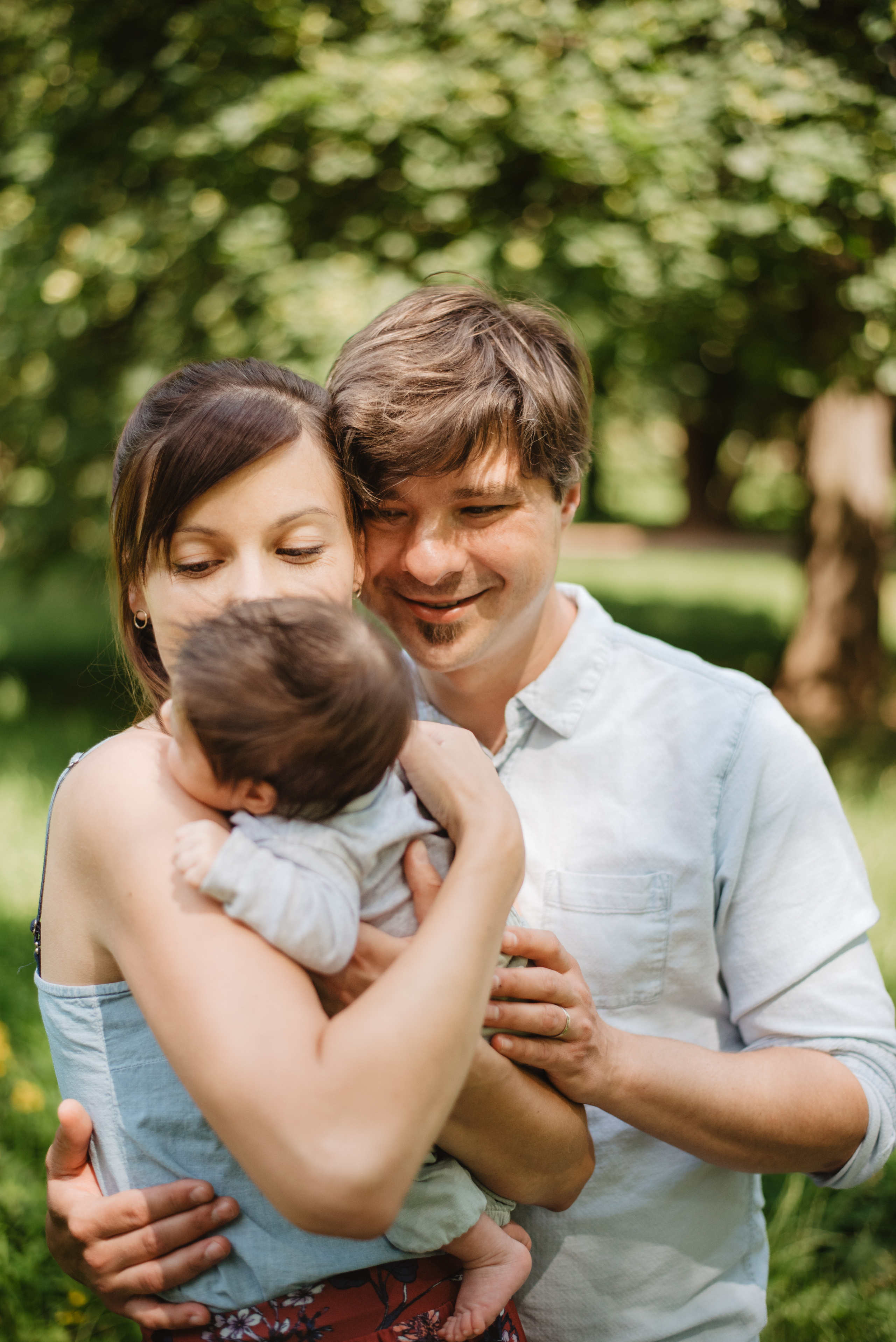 Family photography in park. Lifestyle, wedding and family photographer