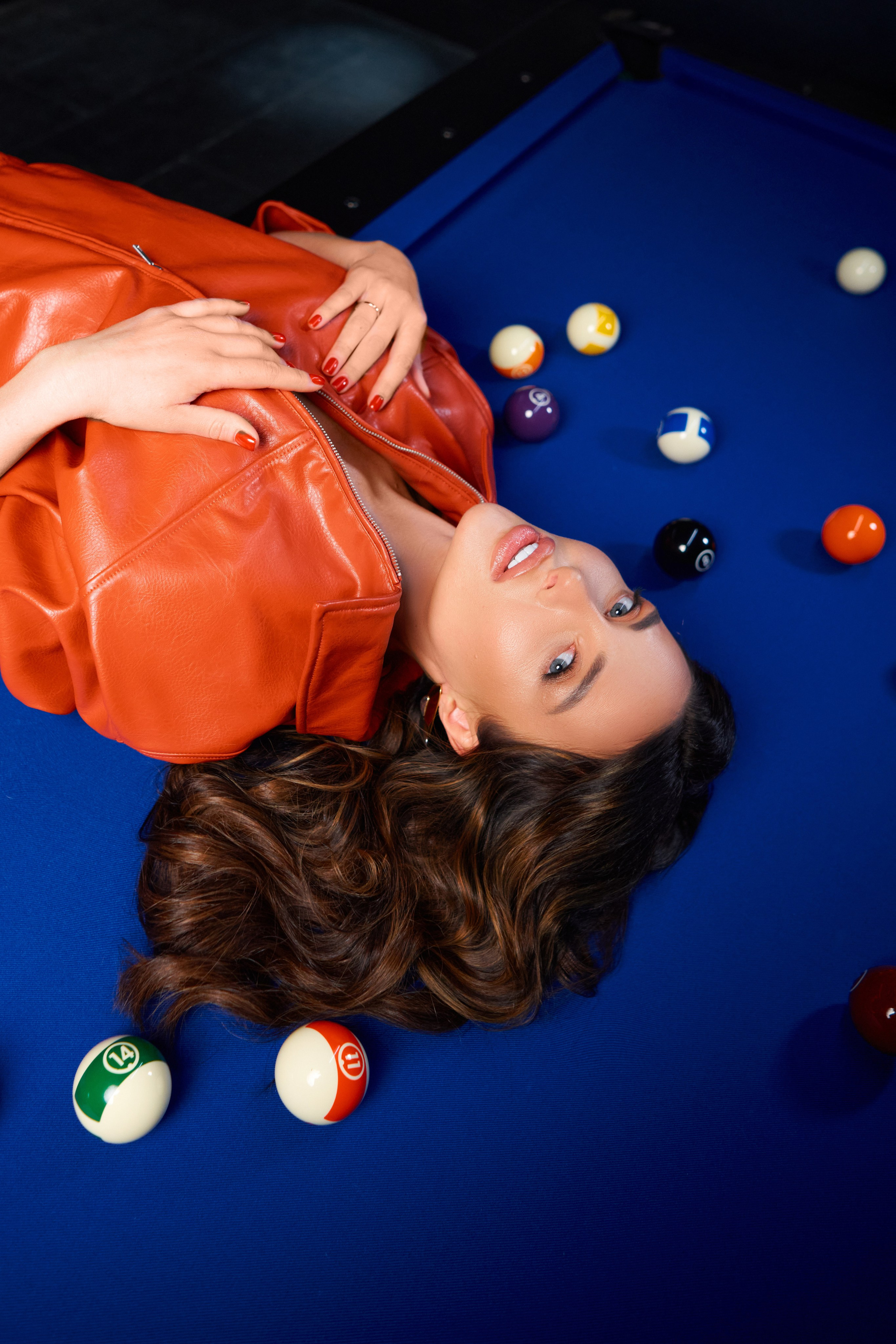 Lifestyle photo of woman in casual wear inside stylish billiard room apartment