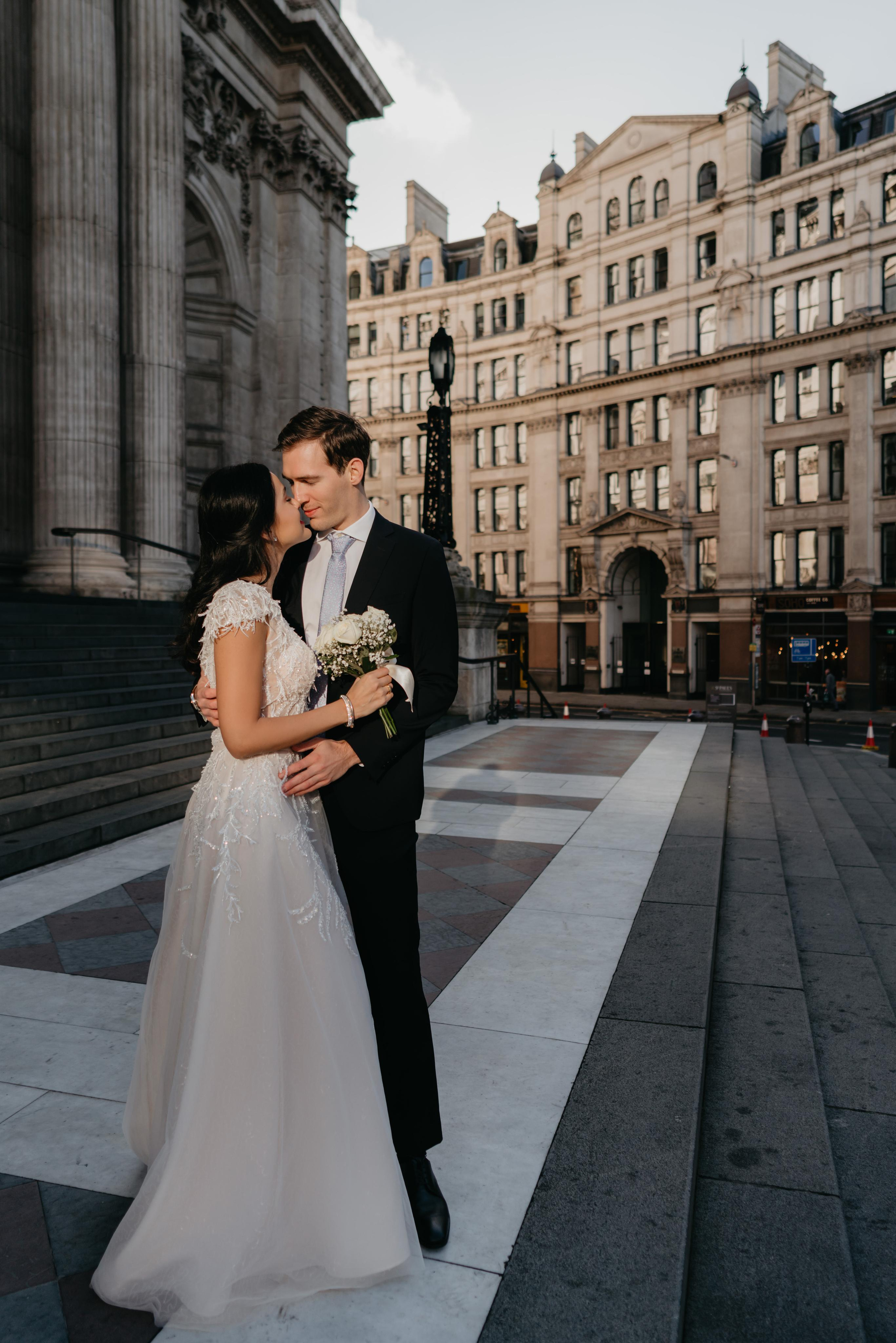Wedding session by Tower Bridge and St Pauls Cathedral. London portrait and family photographer