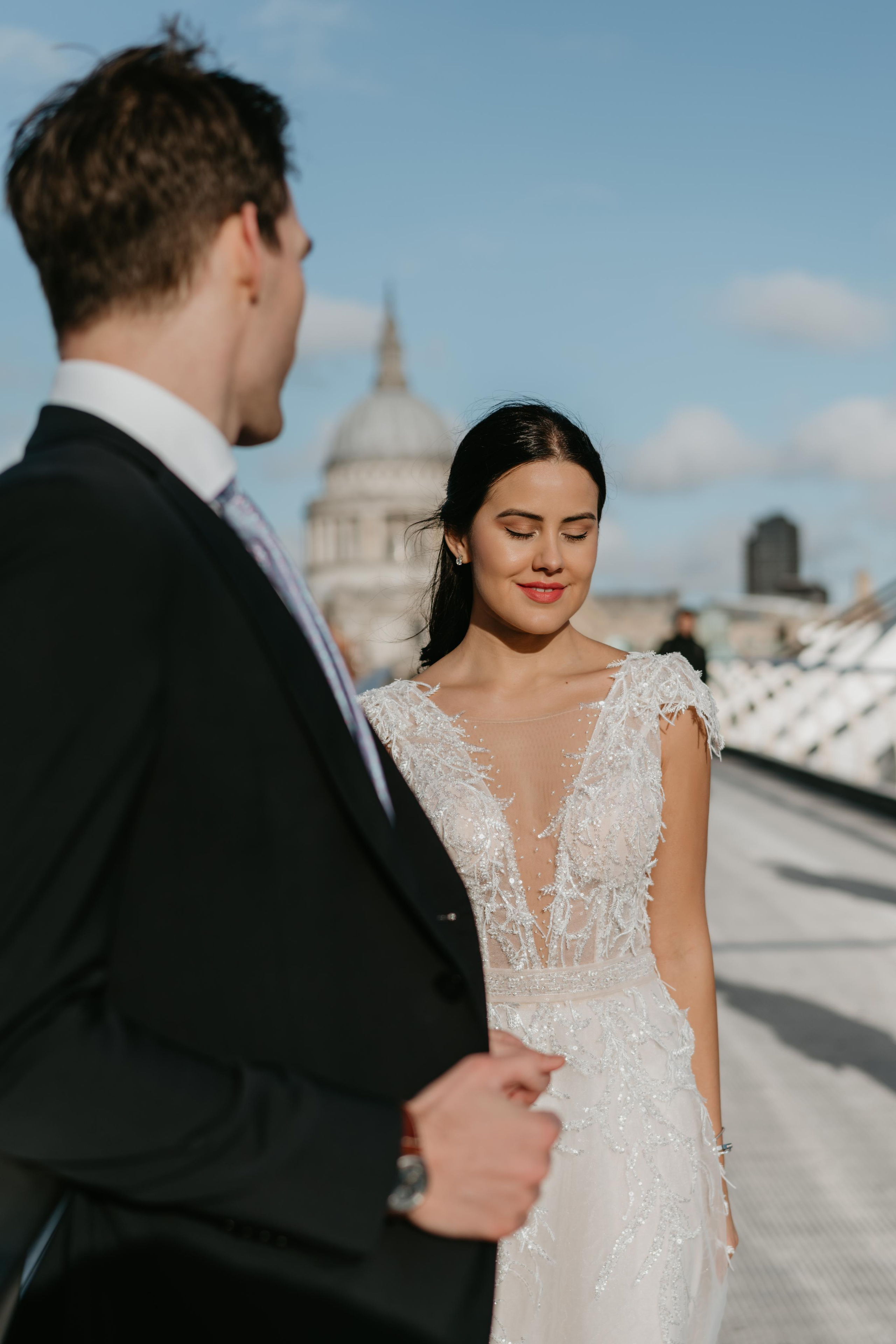 Wedding session by Tower Bridge and St Pauls Cathedral. London portrait and family photographer