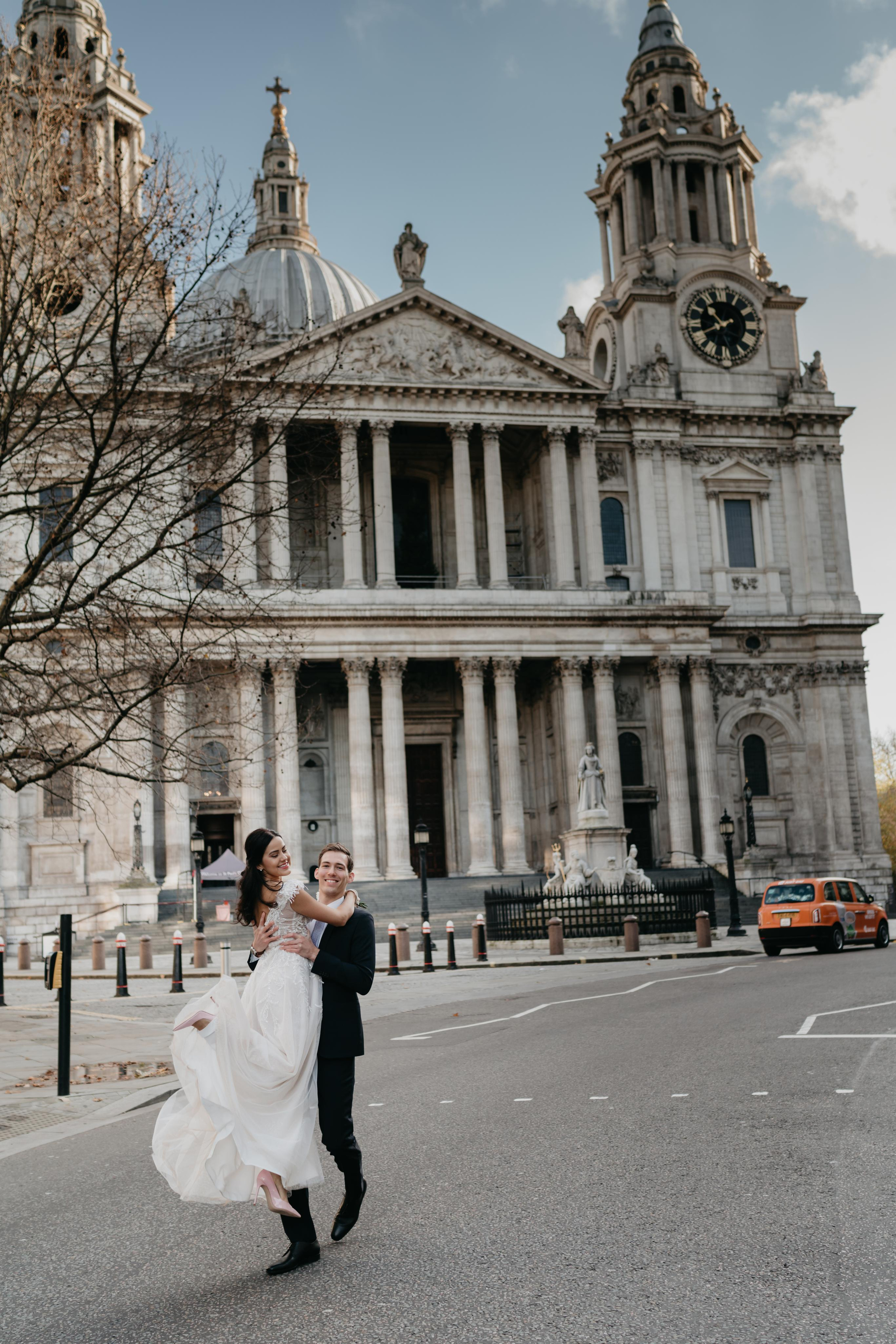 Wedding session by Tower Bridge and St Pauls Cathedral. London portrait and family photographer