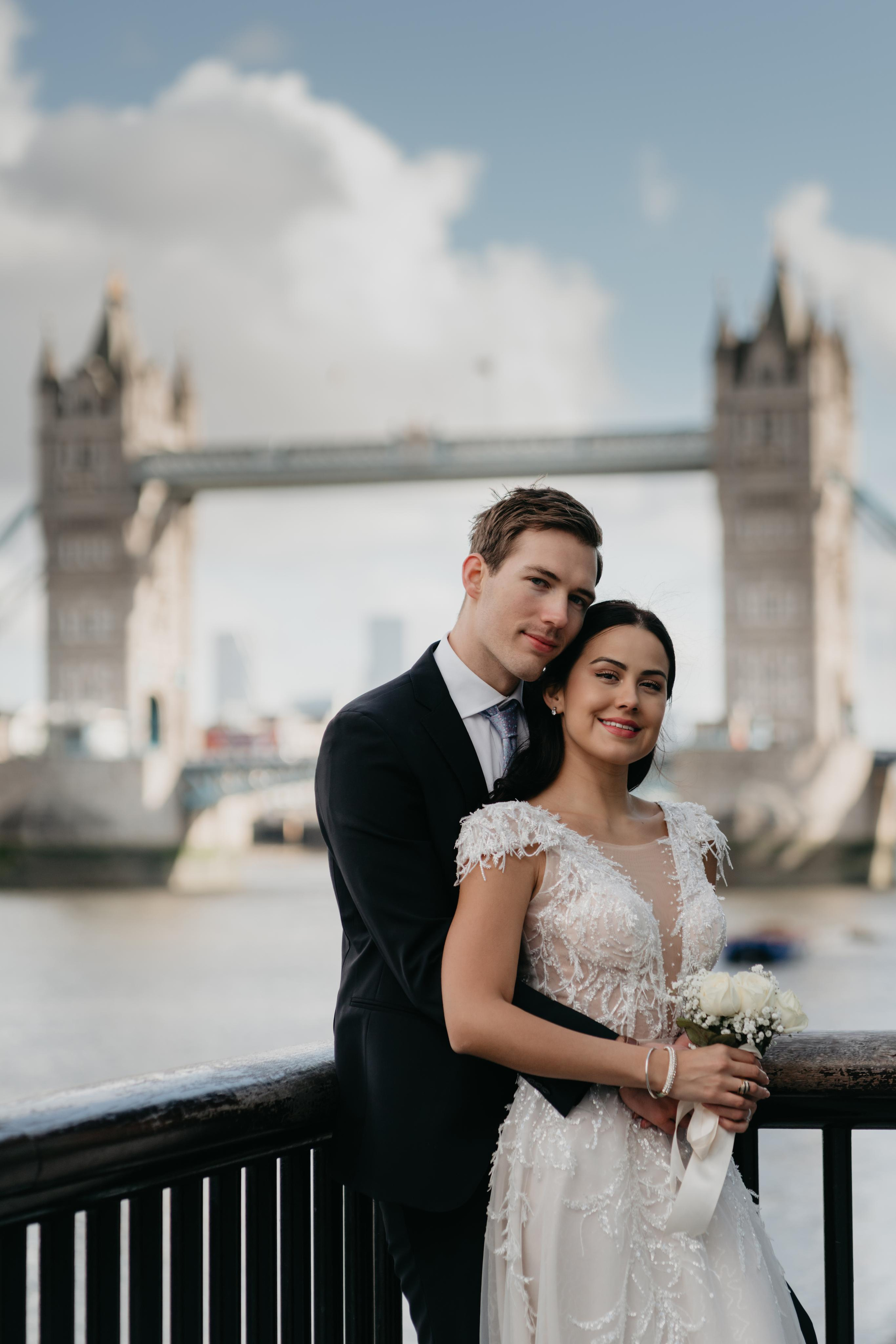 Wedding session by Tower Bridge and St Pauls Cathedral. London portrait and family photographer