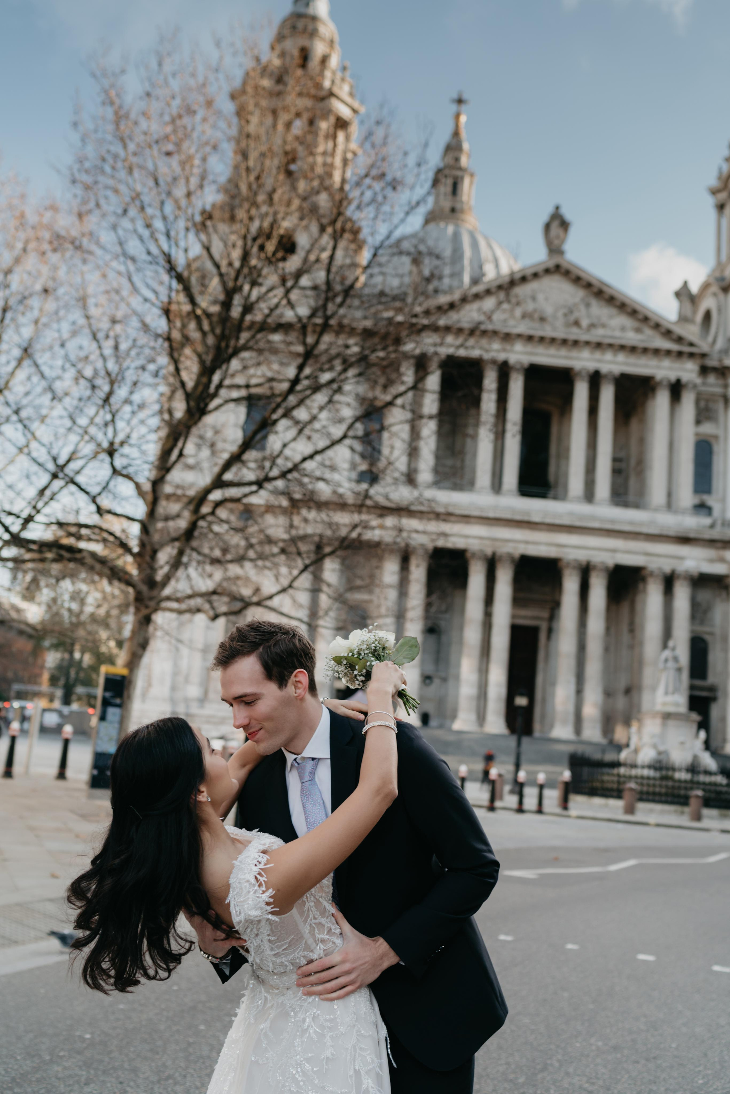 Wedding session by Tower Bridge and St Pauls Cathedral. London portrait and family photographer