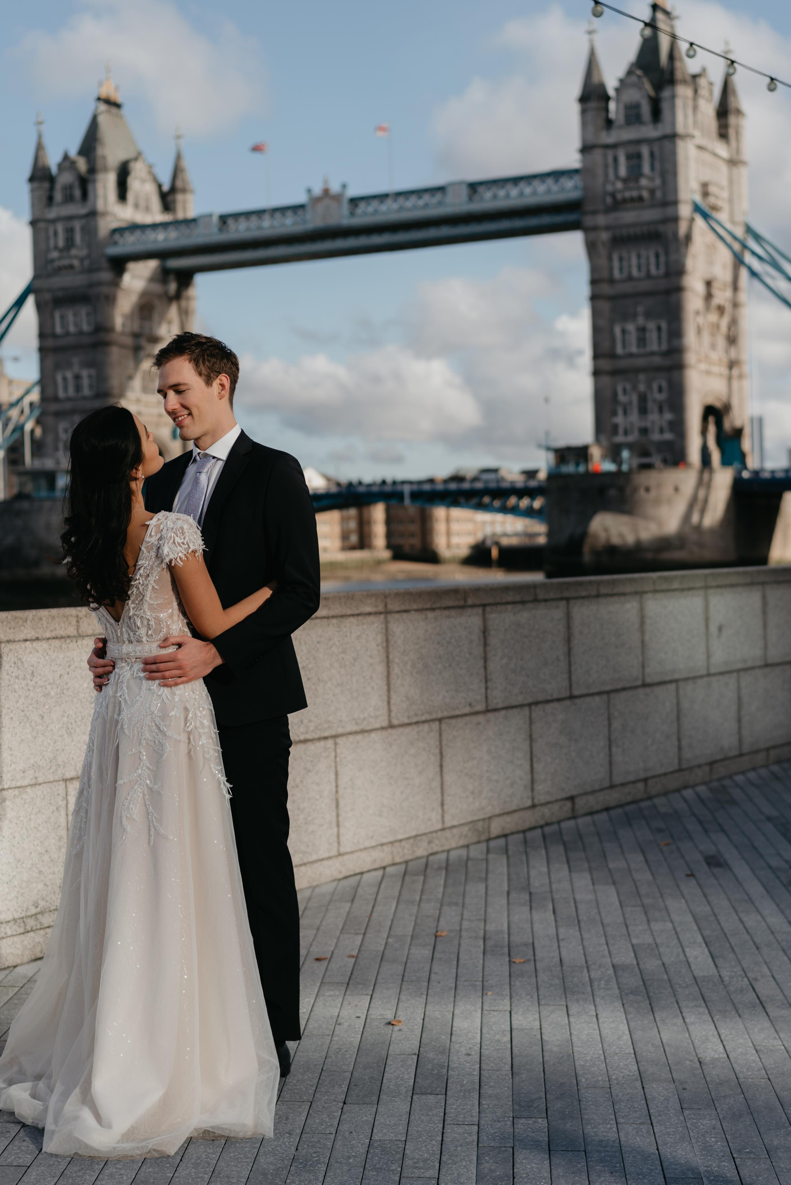 Wedding session by Tower Bridge and St Pauls Cathedral. London portrait and family photographer