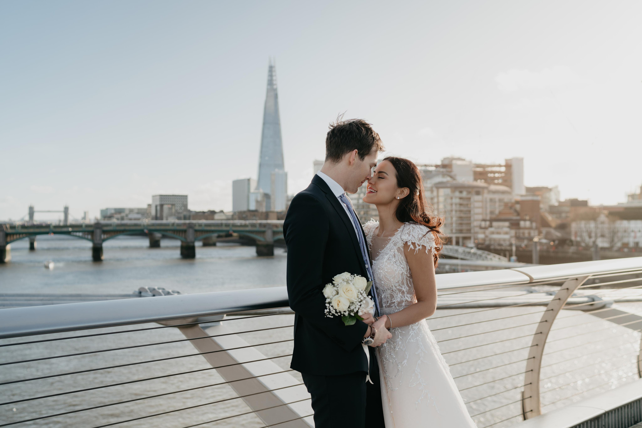 Wedding session by Tower Bridge and St Pauls Cathedral. London portrait and family photographer