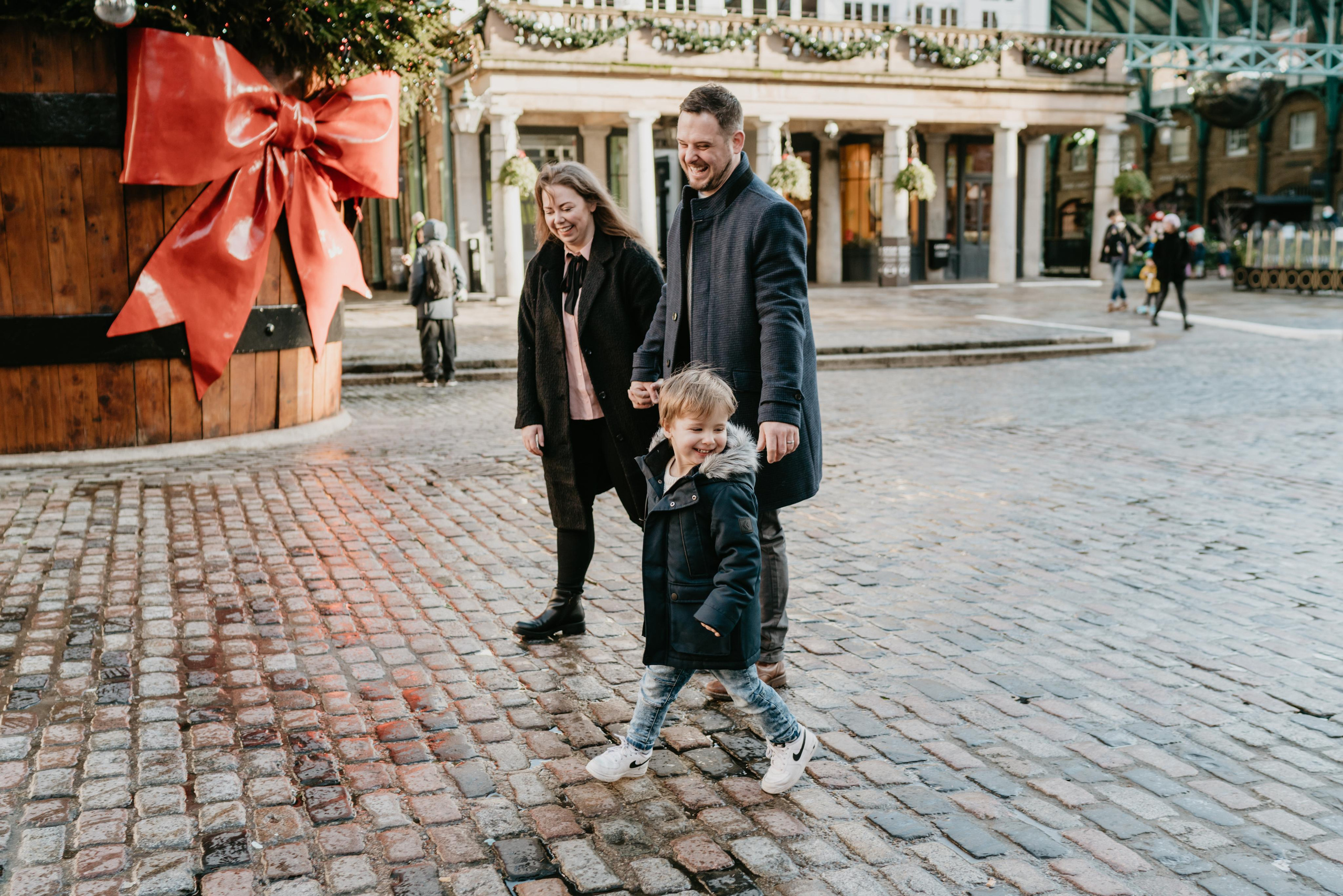 Family Christmas session in Covent Garden. London portrait and family photographer