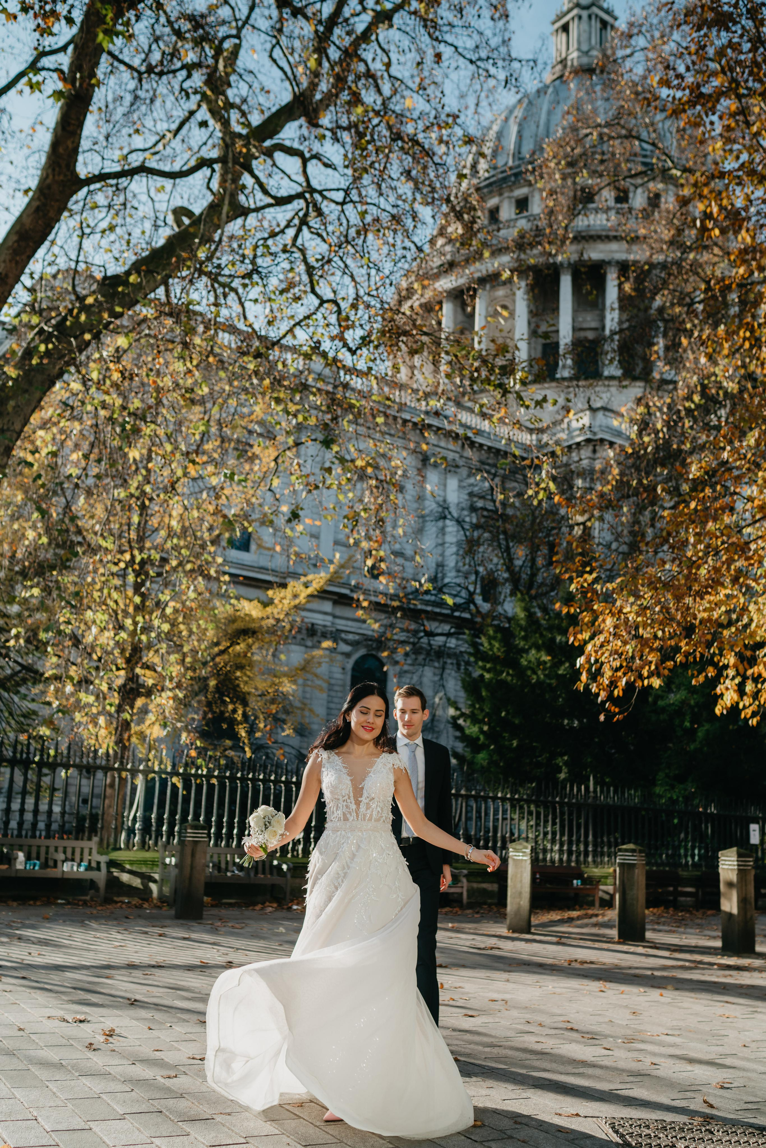 Wedding session by Tower Bridge and St Pauls Cathedral. London portrait and family photographer