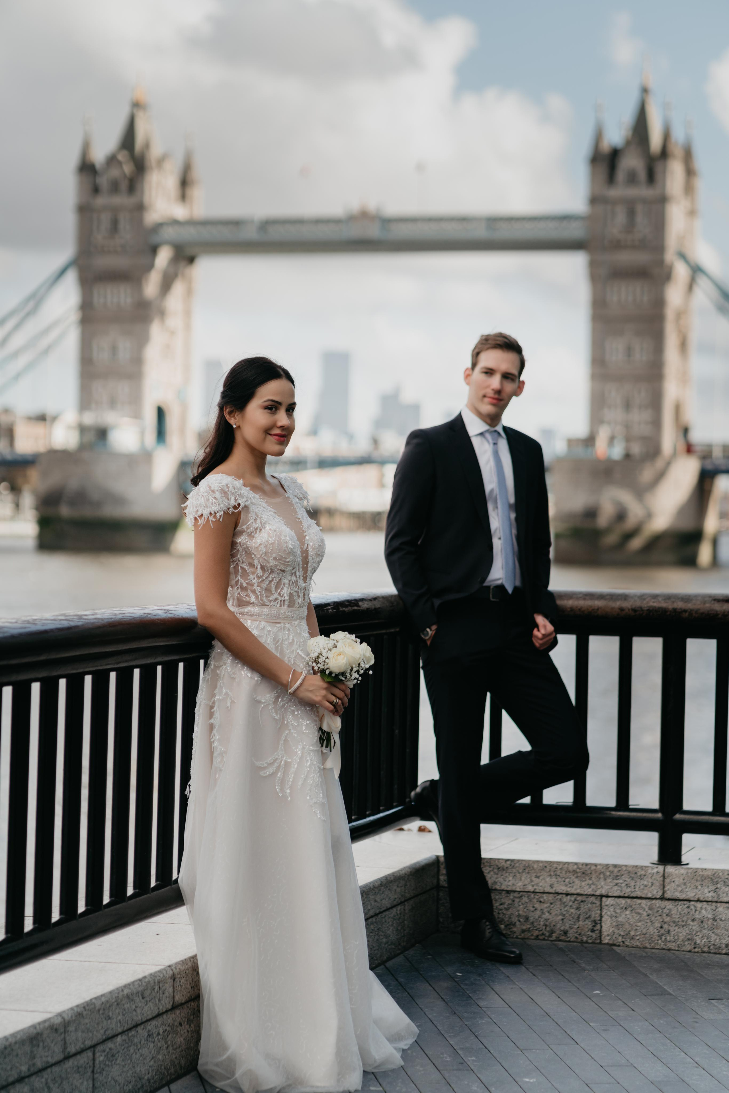 Wedding session by Tower Bridge and St Pauls Cathedral. London portrait and family photographer