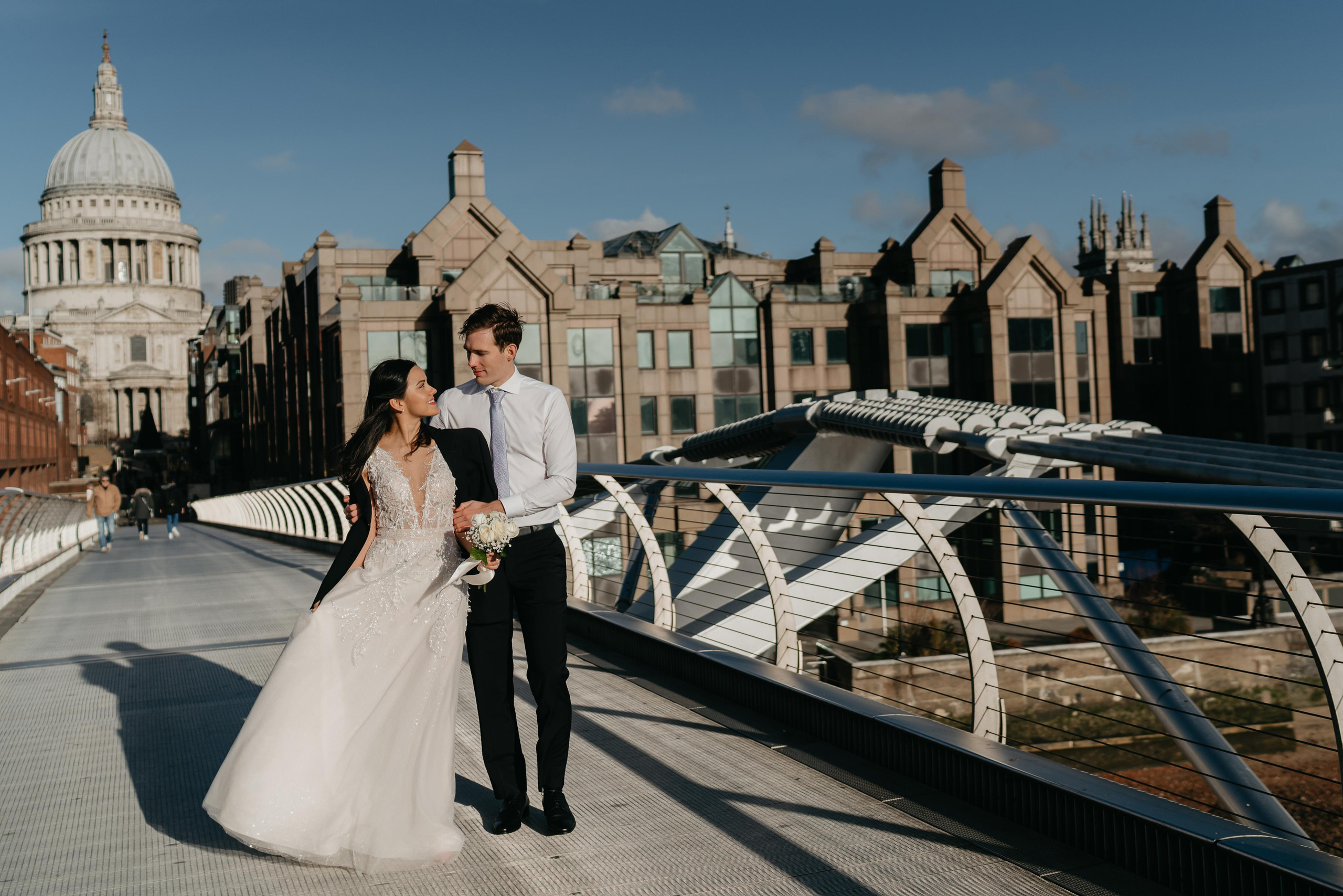 Wedding session by Tower Bridge and St Pauls Cathedral. London portrait and family photographer