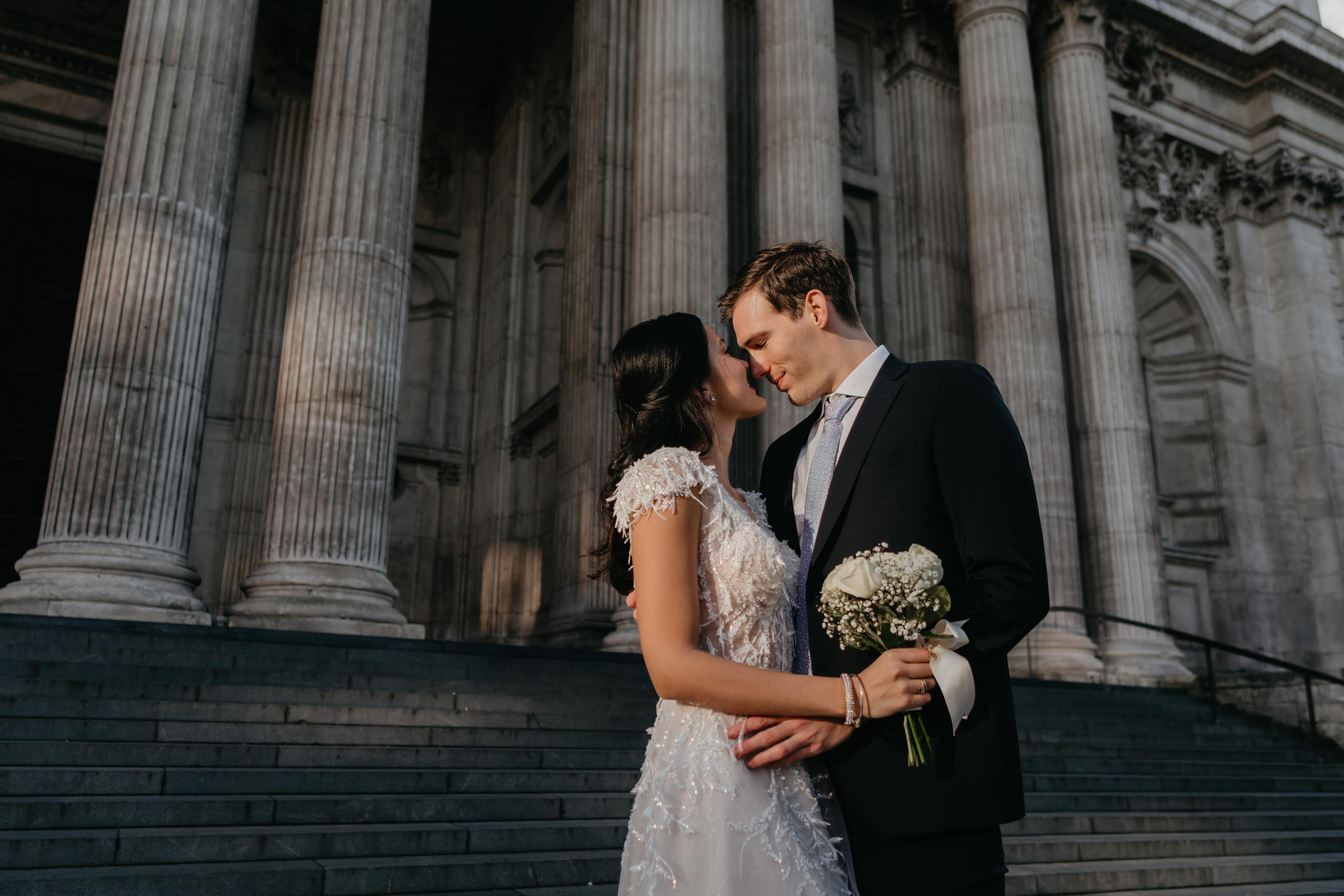 Wedding session by Tower Bridge and St Pauls Cathedral. London portrait and family photographer