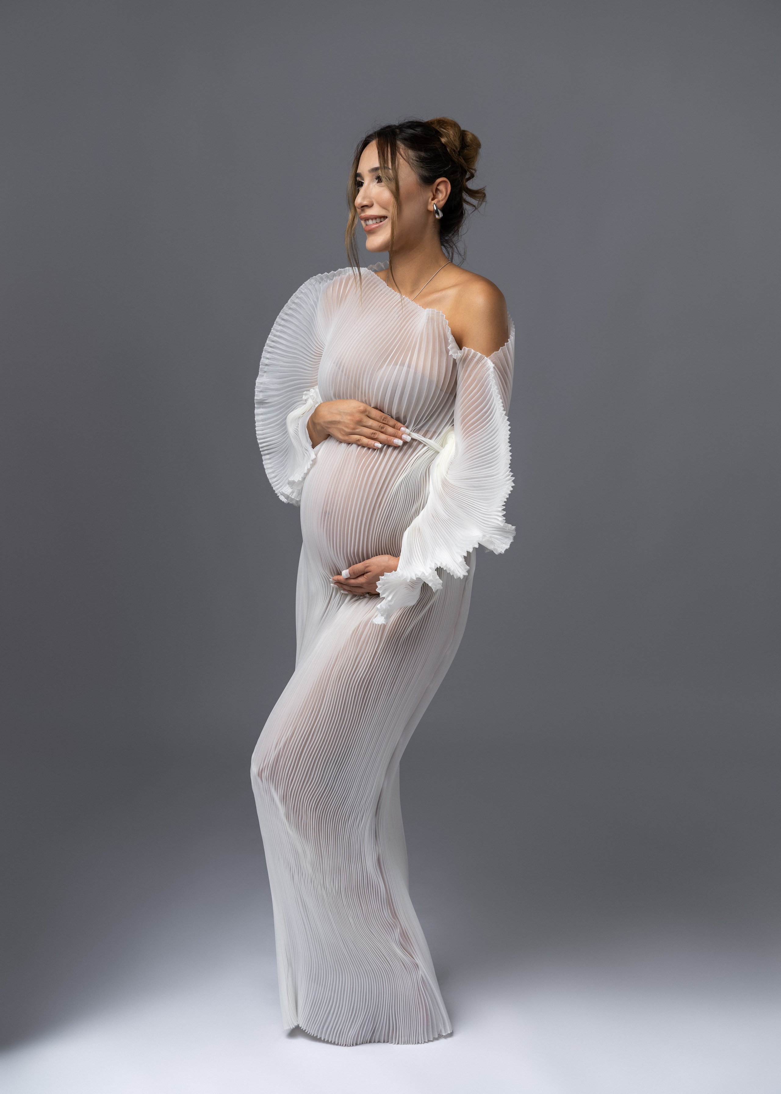 Anna, Fotografin aus Wien, Österreich. Ich fotografiere in folgenden Genres: Babybauch-, Familien-, Mode- und Weihnachtsfotografie