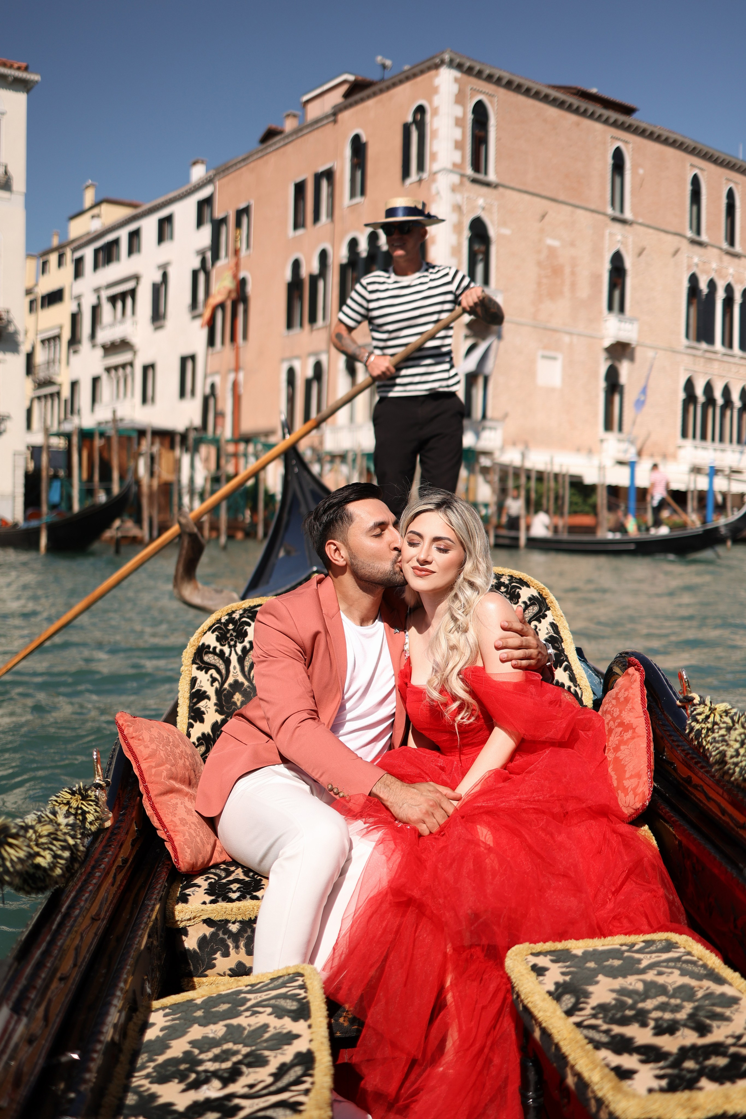 couple kissing in a gondola 