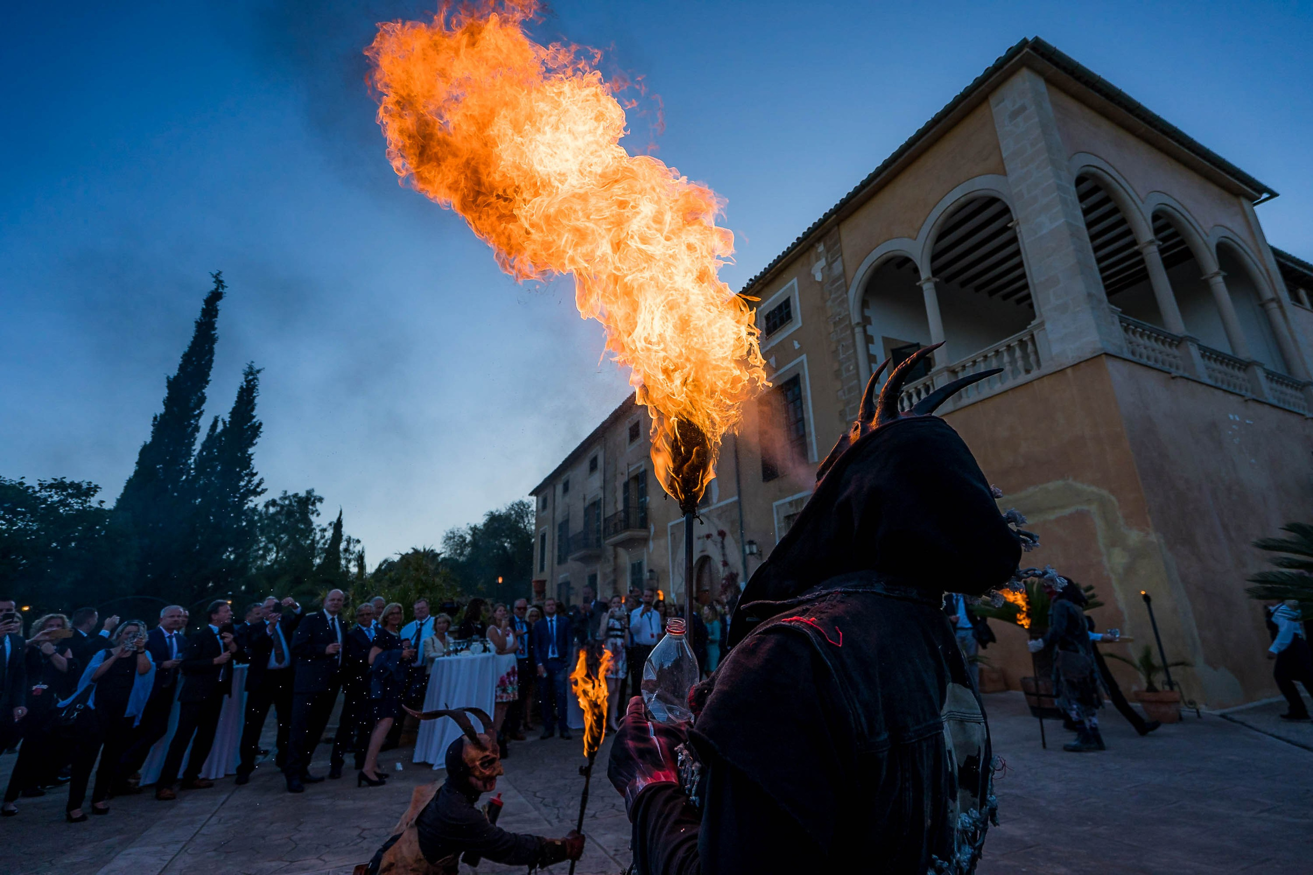 Fire and smoke with devils at Ses Cases de Sa Font Seca