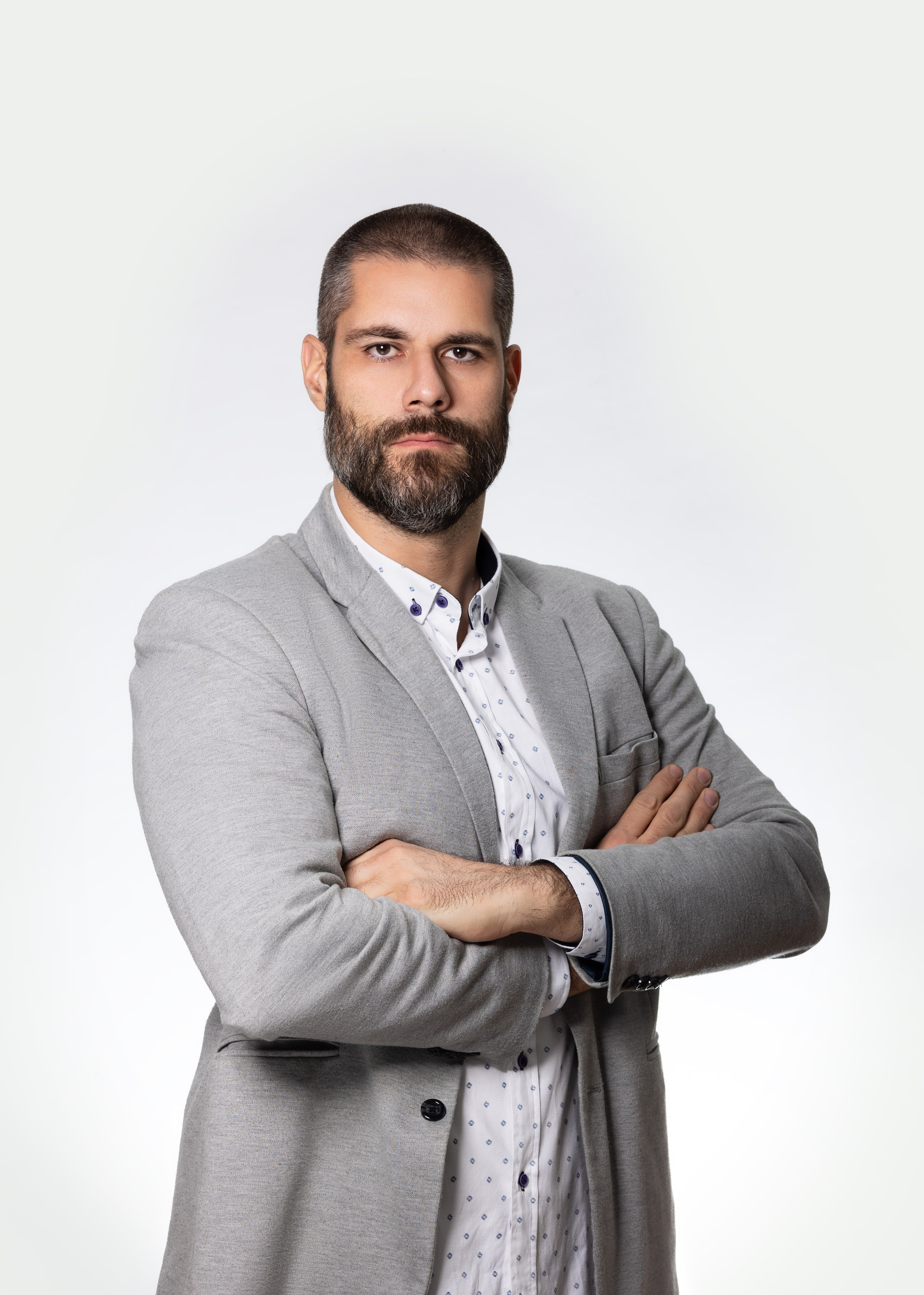 Corporate team member at 1 click Marketing, a business portrait on a white background