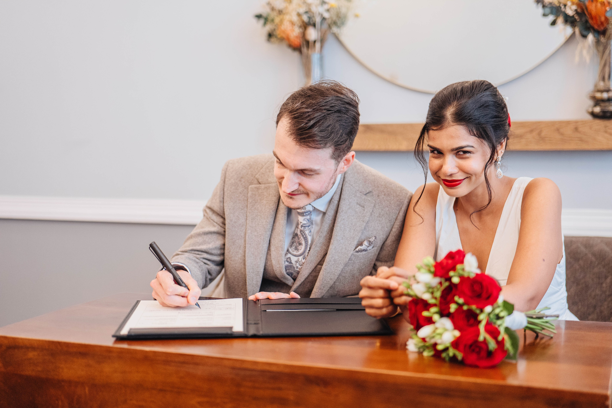 Wedding in Islington town hall, signing documents