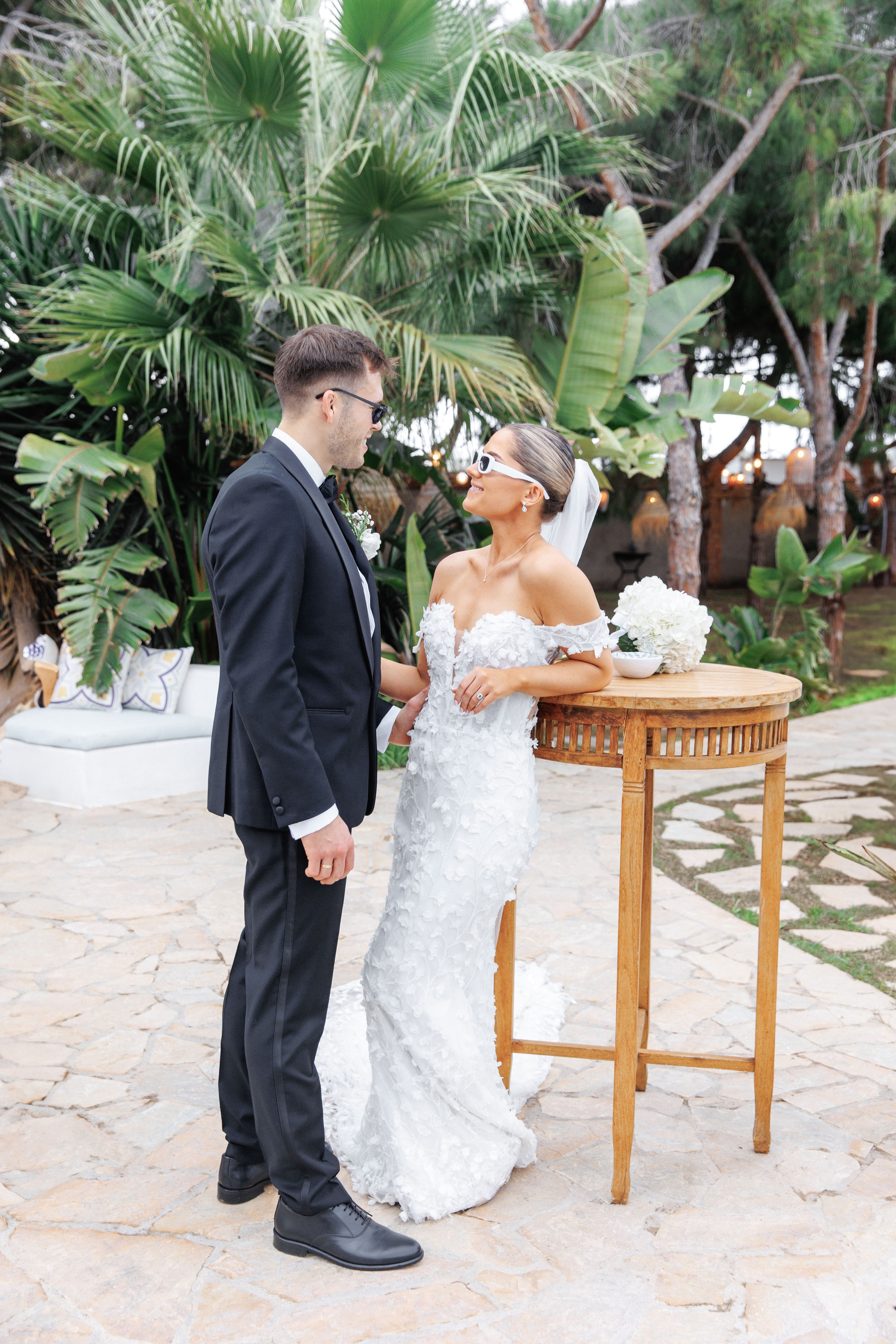 Candid shot of the bride and groom enjoying a joyful moment together during their wedding day in Barcelona.