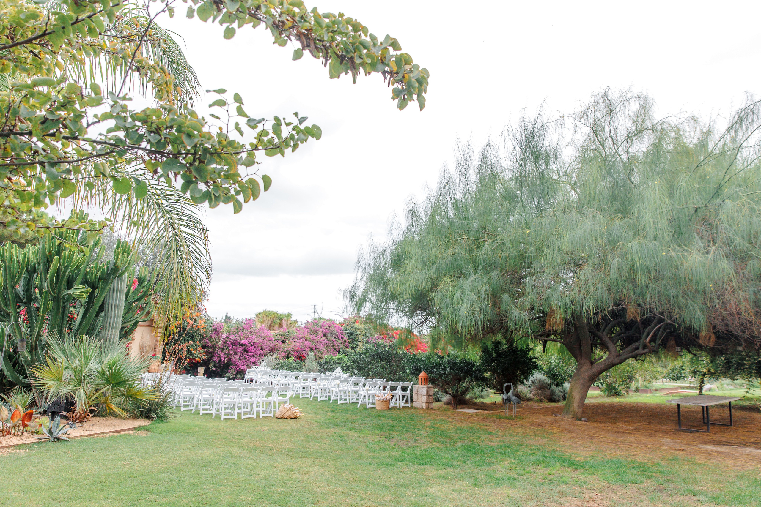 Stunning outdoor wedding venue in Barcelona with lush greenery and a breathtaking garden, perfect for ceremonies.