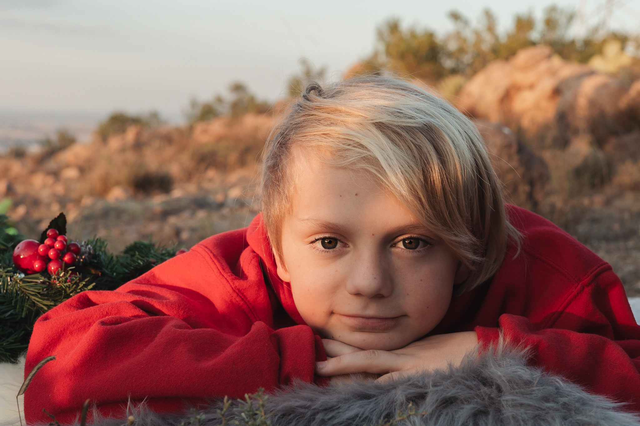 Boy in a red sweater christmas photo 
