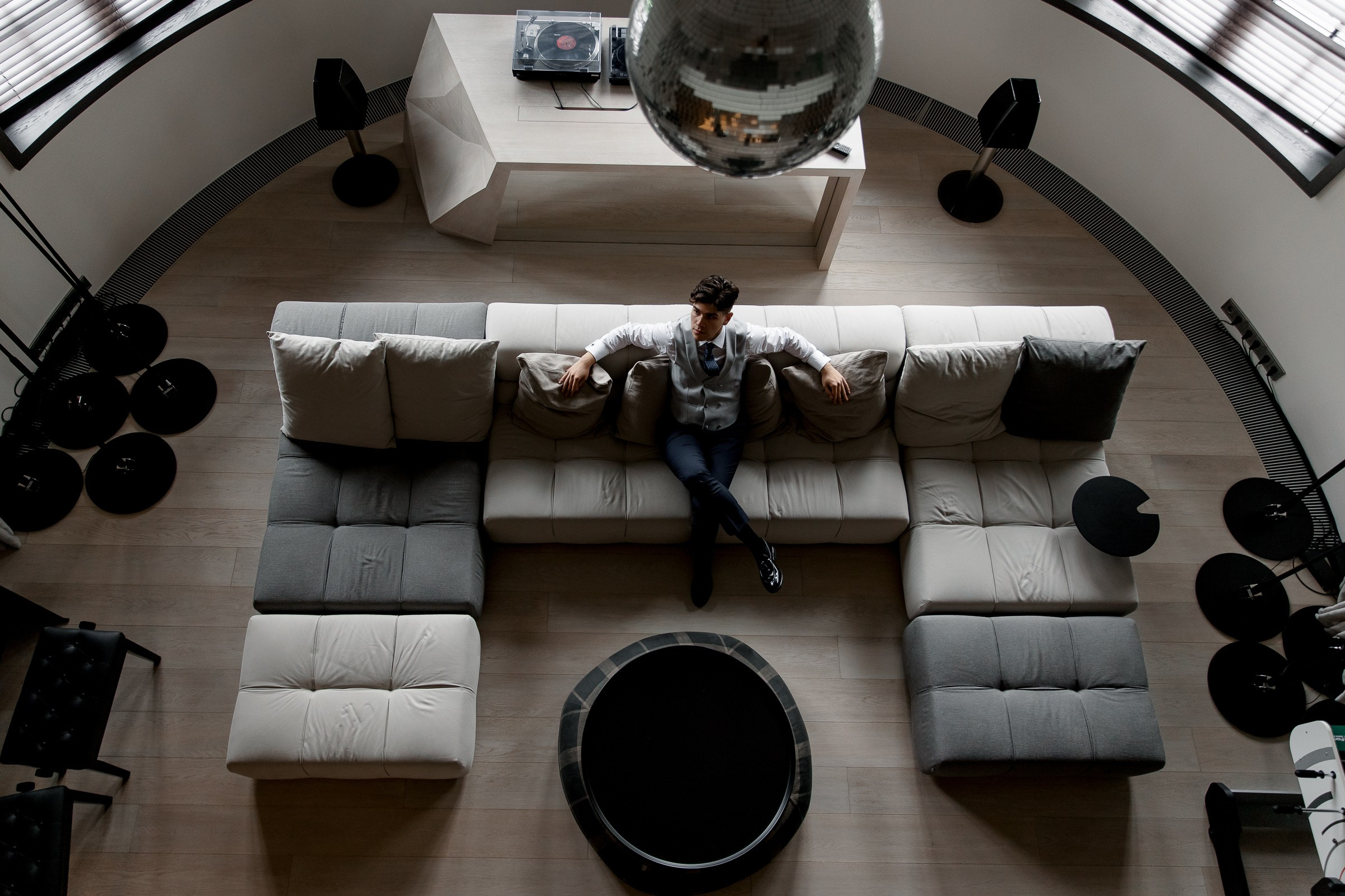 Groom relaxing portrait before wedding, by Cornwall editorial photographer.