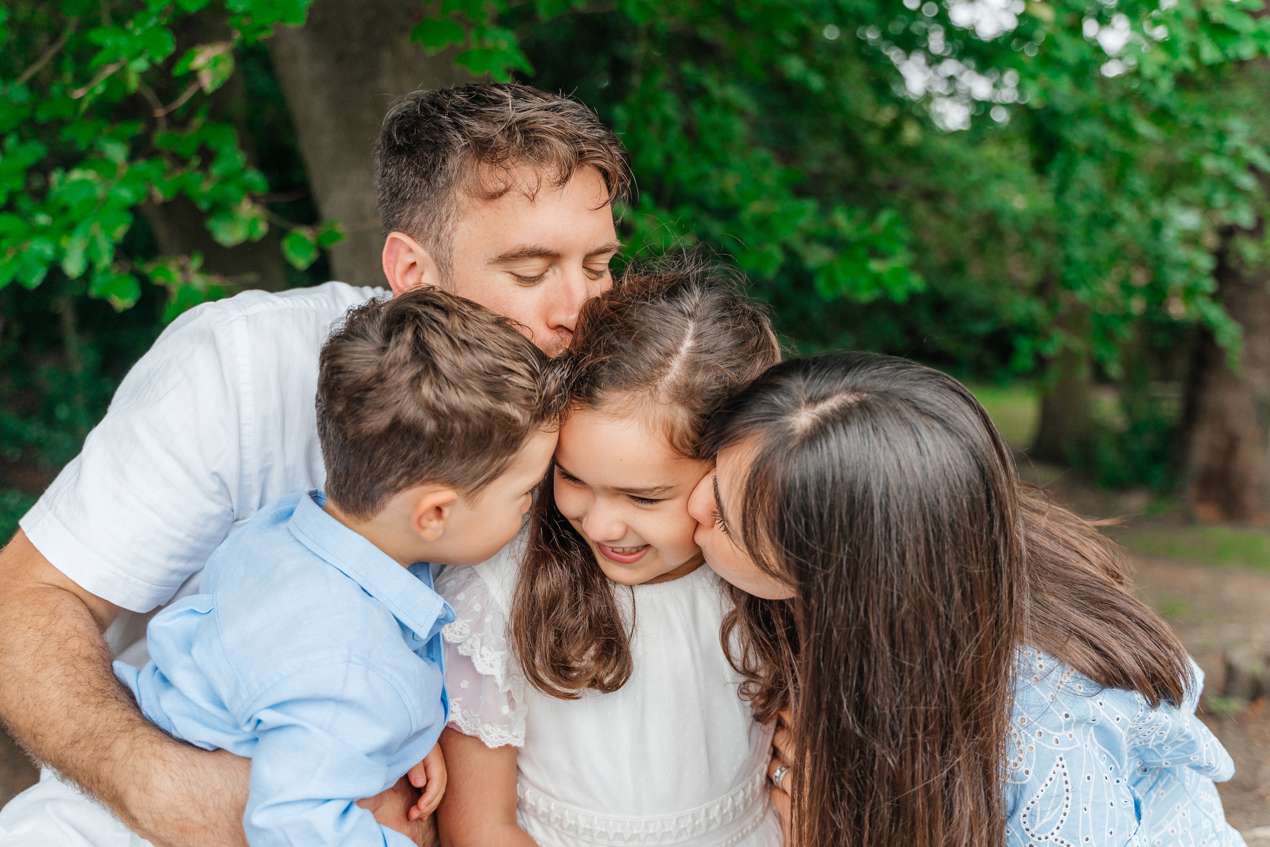 A family photo shoot in black park.