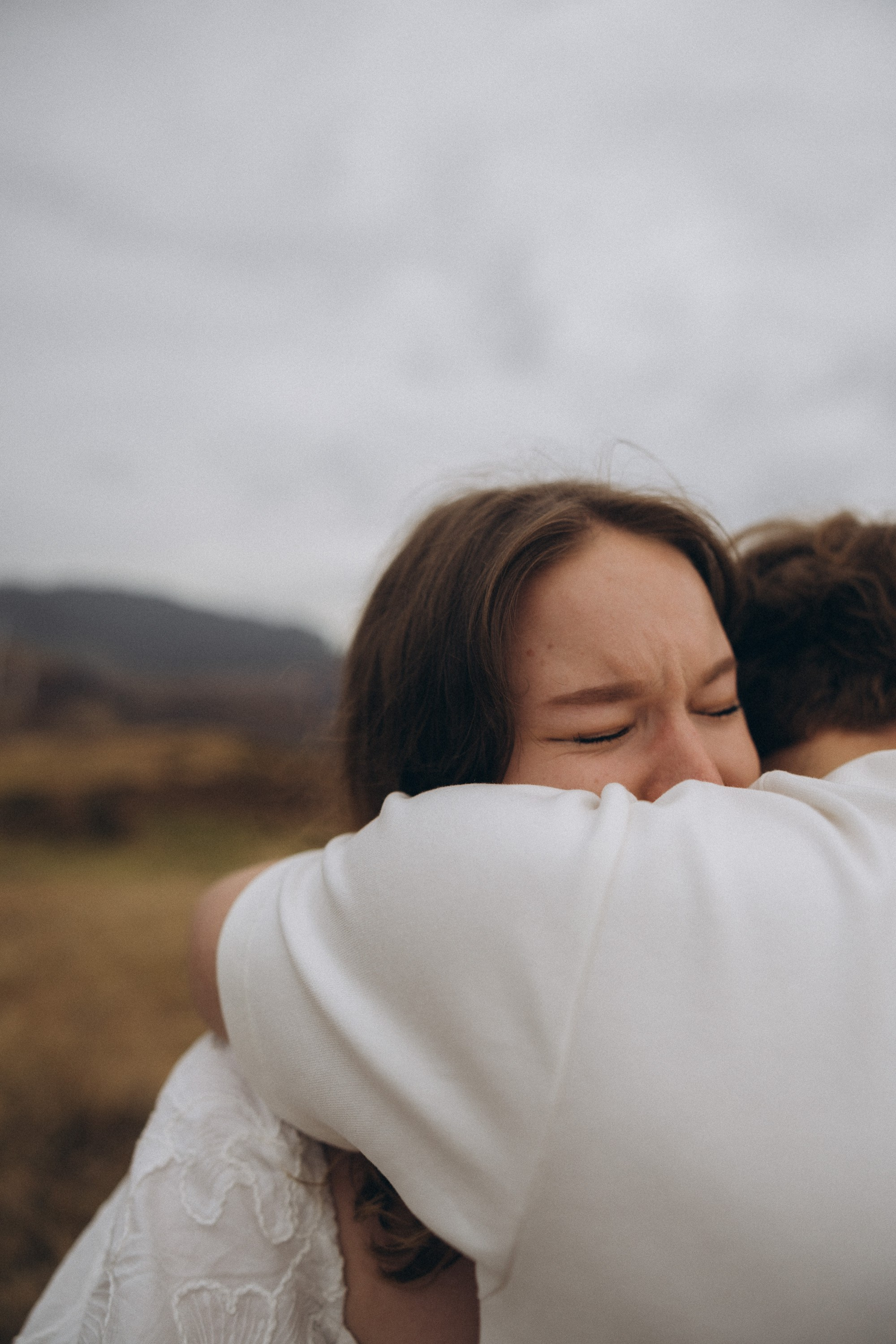 Surprise marriage proposal in São Lourenço, Madeira – romantic couple photography on dramatic coastal cliffs