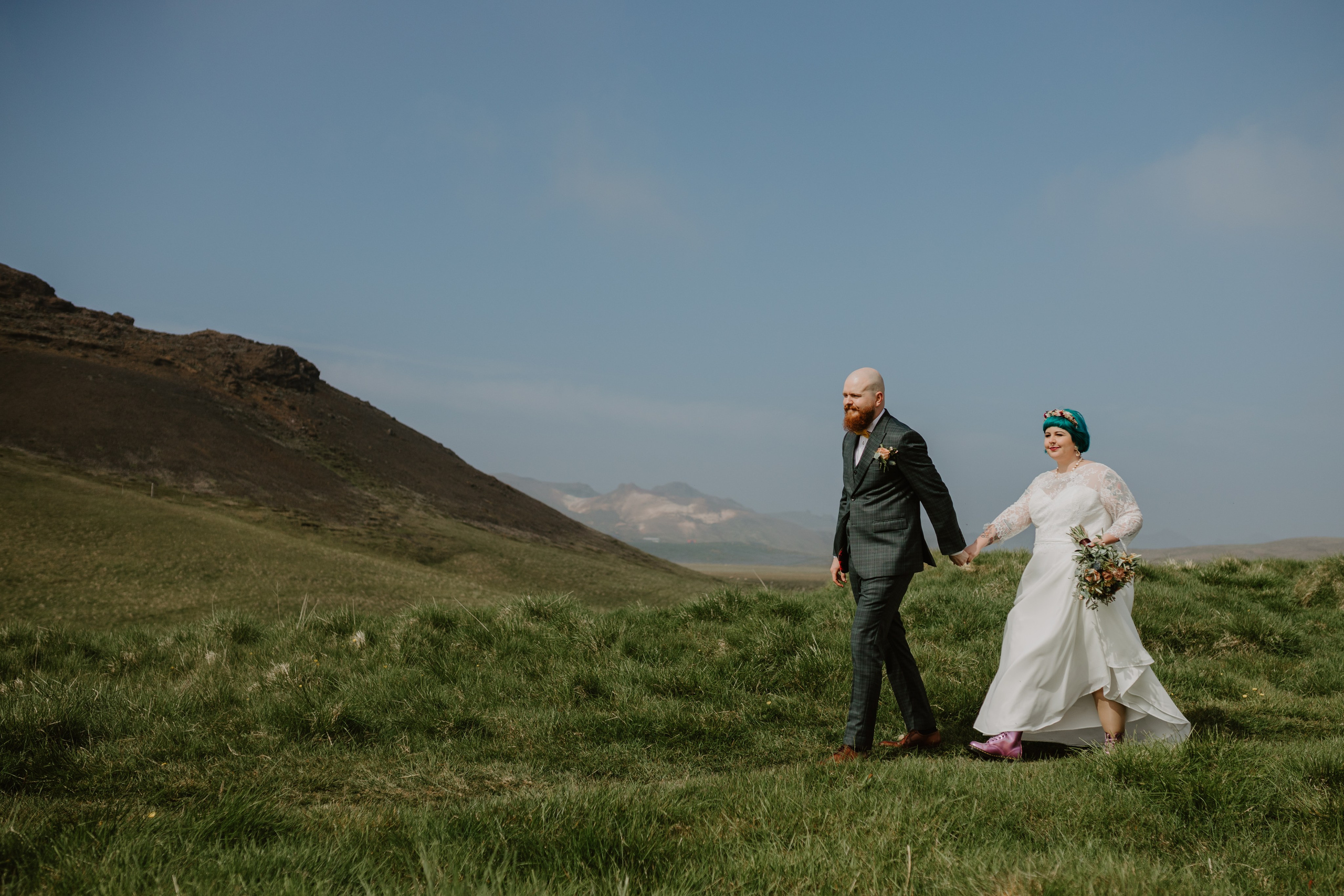 "Intimate couple’s photoshoot in Iceland’s rugged nature, surrounded by waterfalls and mountains. Reykjanes Peninsula