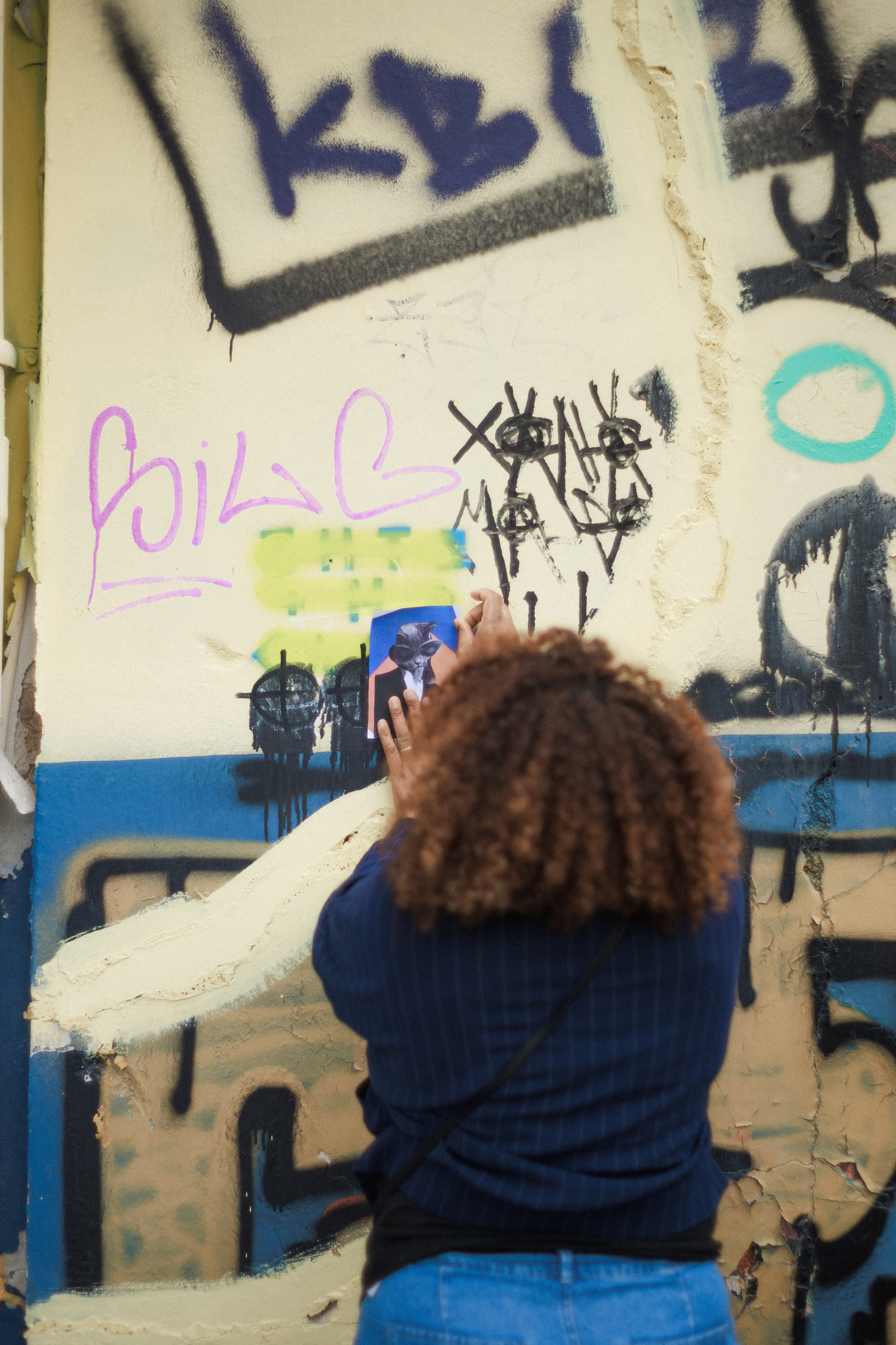 Photographer of the group street intervention “People as Letters to the City”, Athens–Istanbul, 2025. Photographer in Greece Kristina