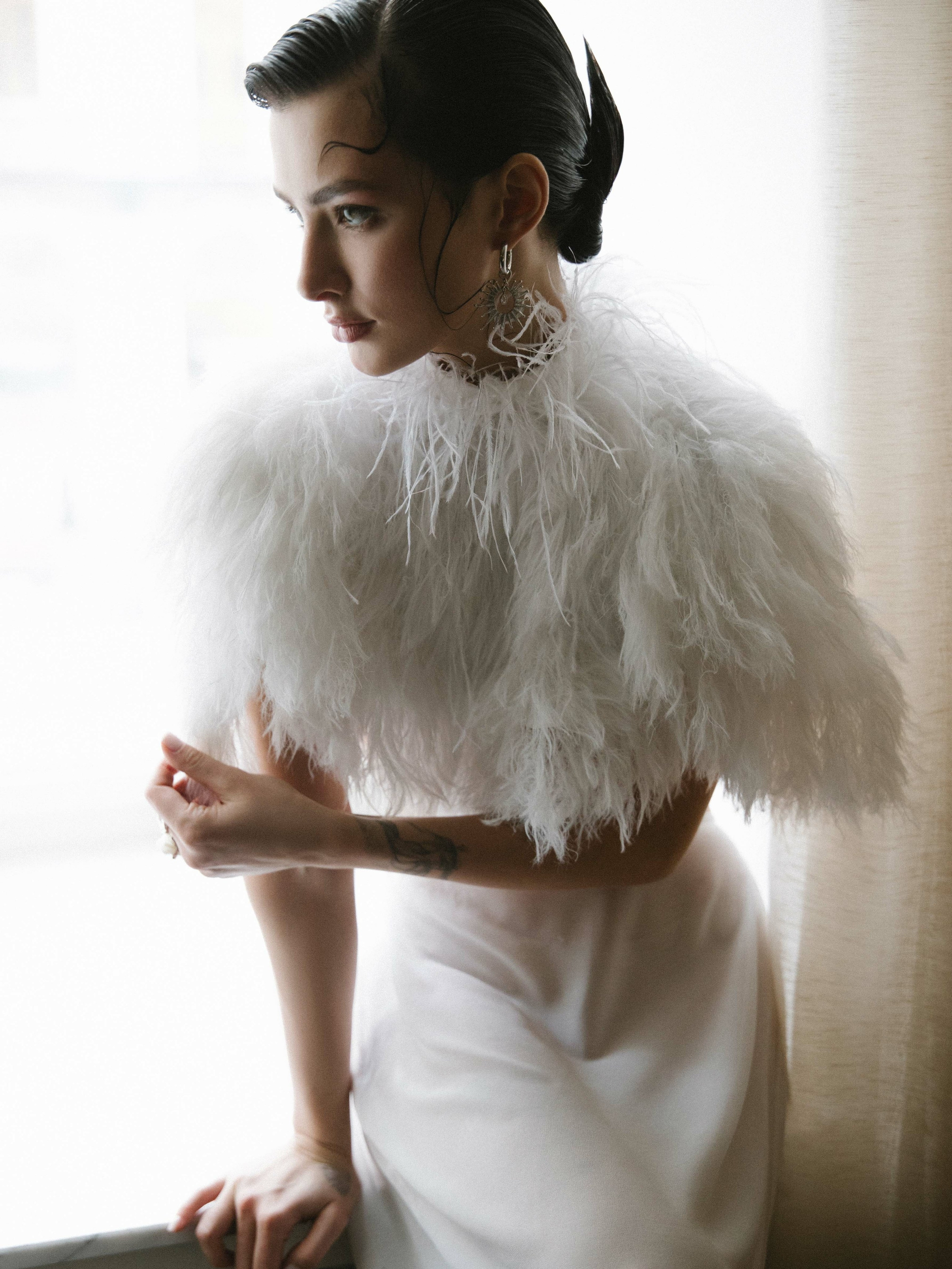 Editorial style close-up of model with dramatic makeup