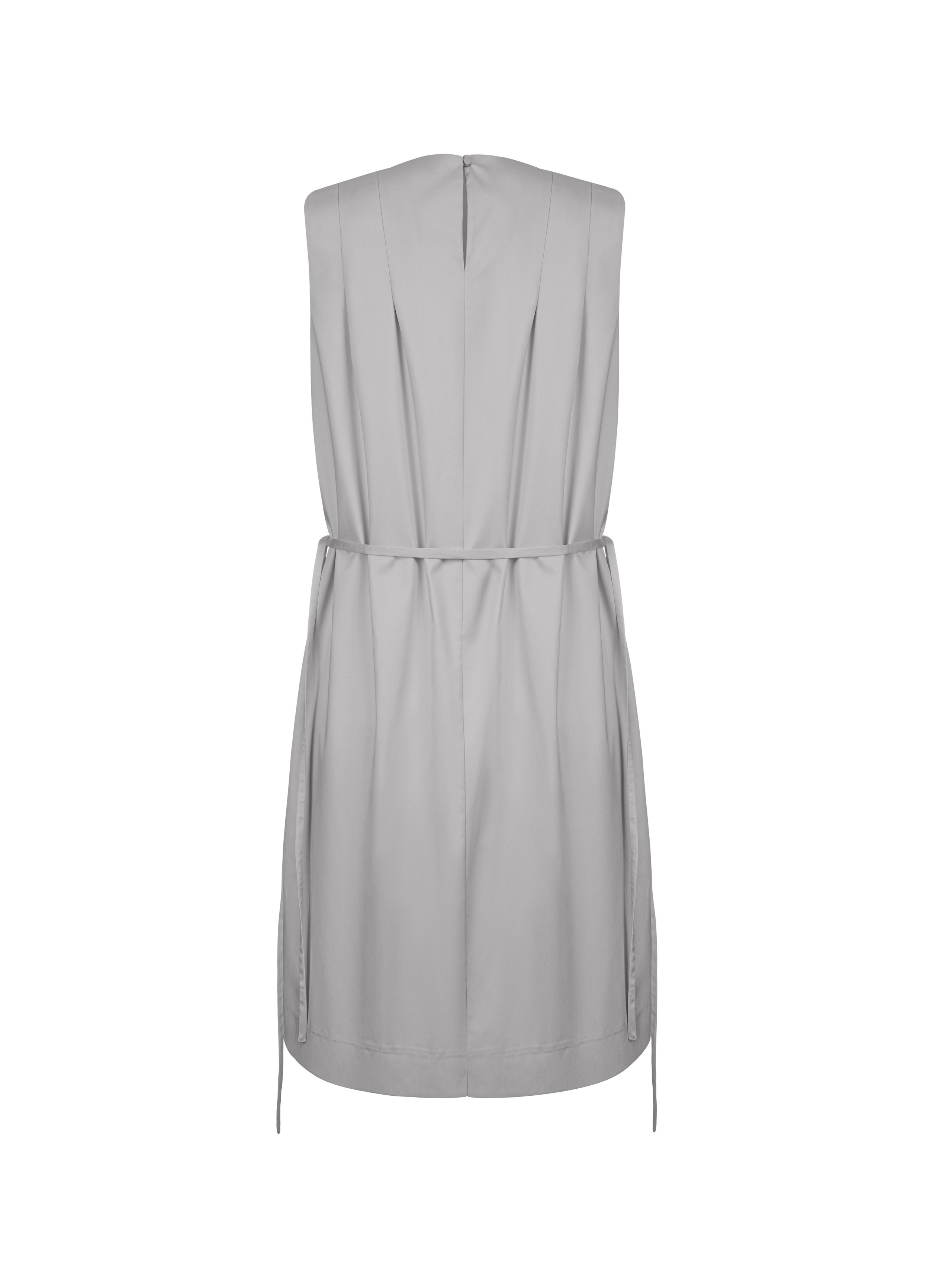 Close-up of denim jeans on a white background