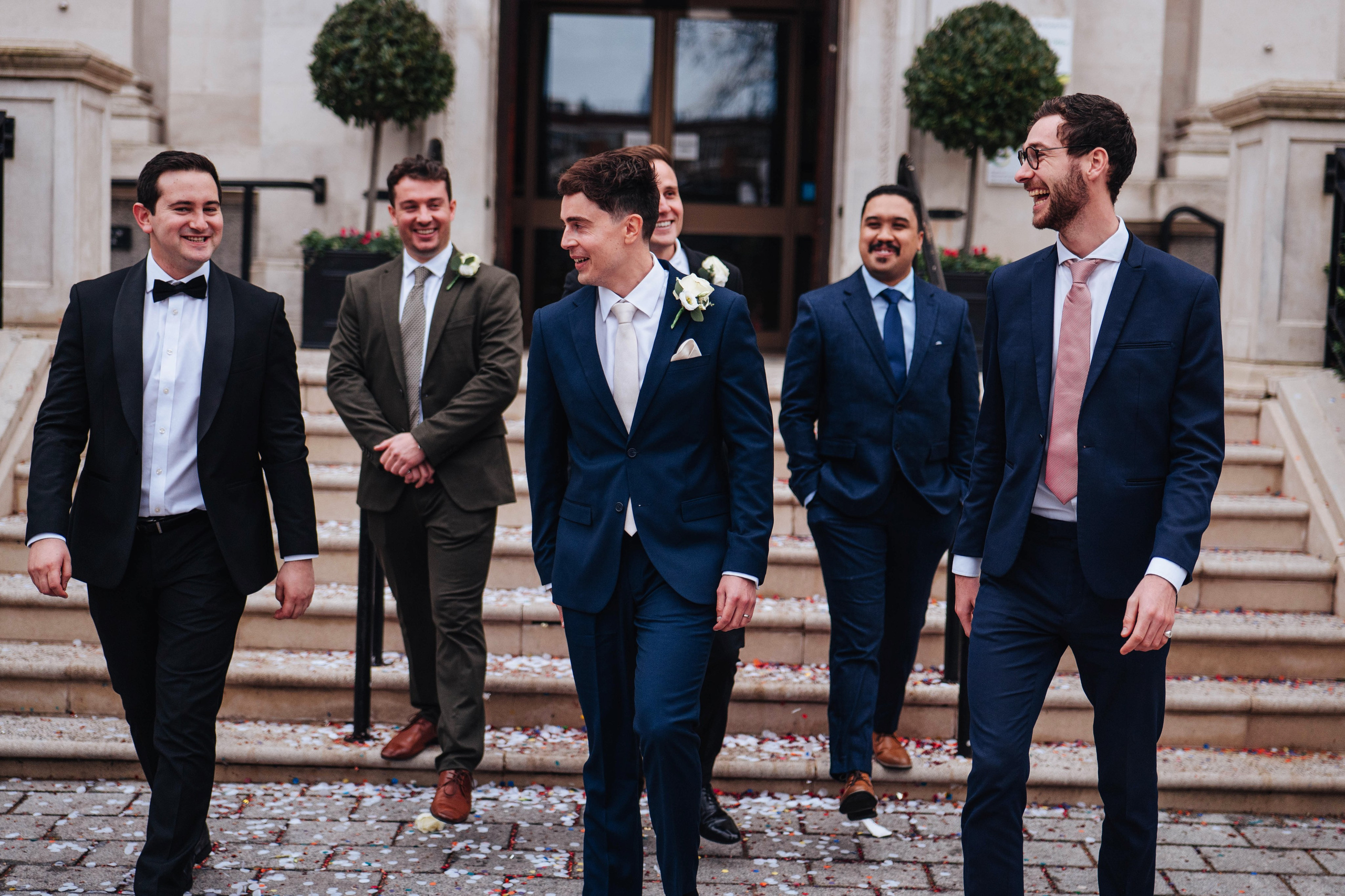 Exit from Islington town hall, meeting the couple with confetti, group photo
