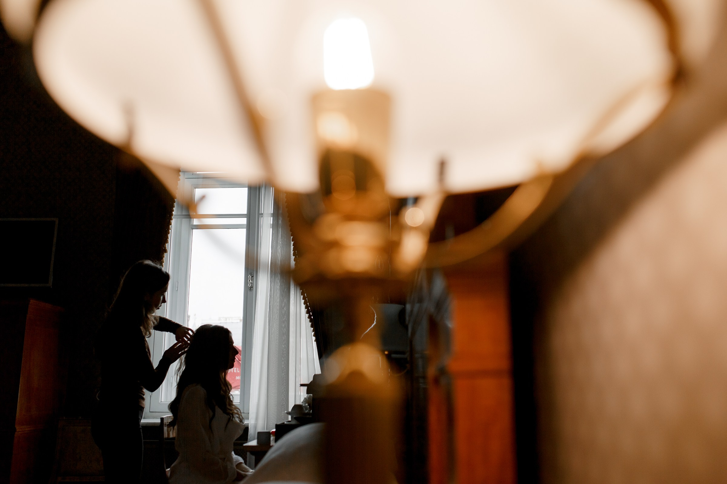 Bride’s hair styling, by Cornwall wedding photographer.