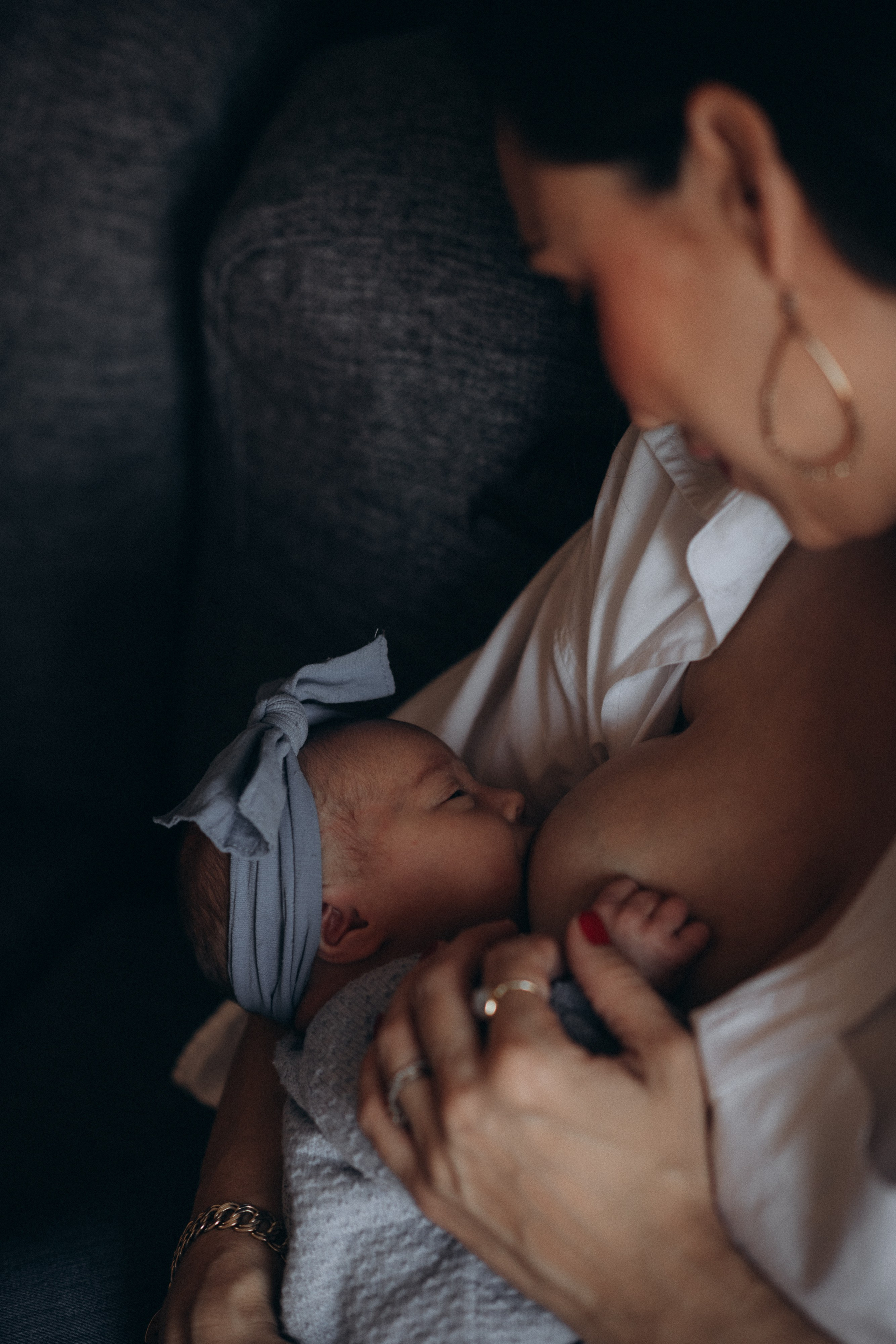 mum feeding her newborn baby