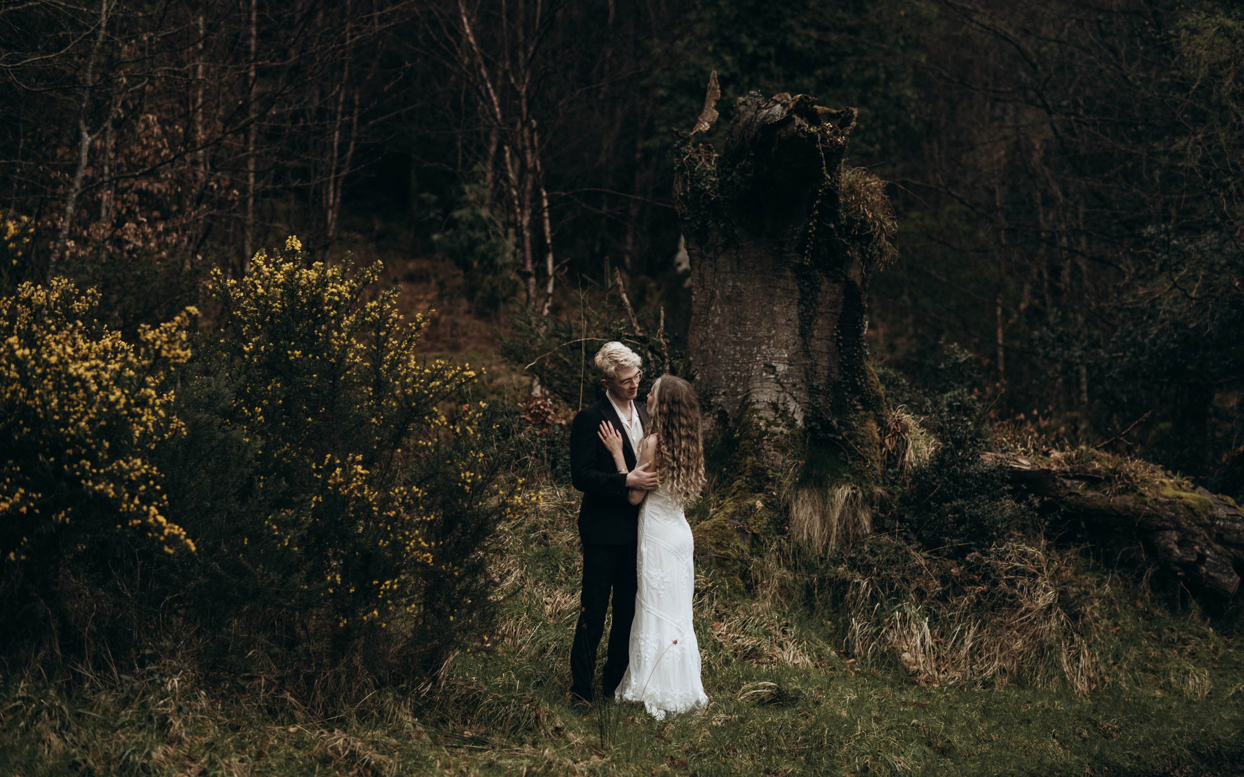young couple in the woods