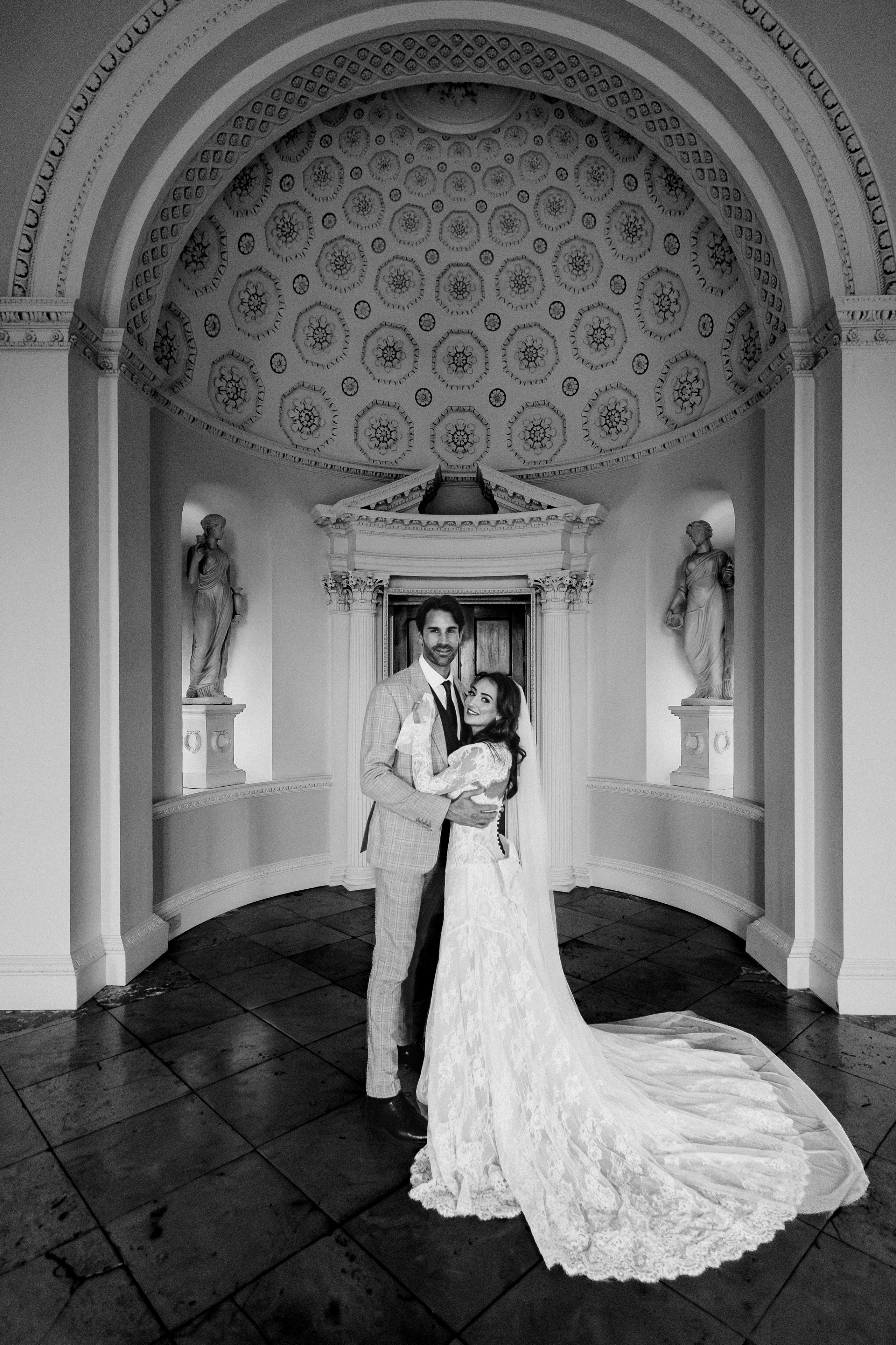 Elegant wedding portrait of bride and groom walking through the streets of ParisRomantic elopement moment captured in soft evening light in Paris, FranceLuxury wedding ceremony setup in a historic French venue with natural floralsCandid black and white photo of a couple at their city wedding in London, UKTimeless couple portrait in front of Marylebone Town Hall, LondonEditorial-style bridal preparation in a classic townhouse in the heart of LondonSoft light bridal portrait in a countryside château wedding in FranceFine art flat lay with French-inspired wedding details and vintage texturesCinematic golden hour photo at a UK estate wedding with historic architectureLuxury wedding tablescape with candles and florals at a London reception