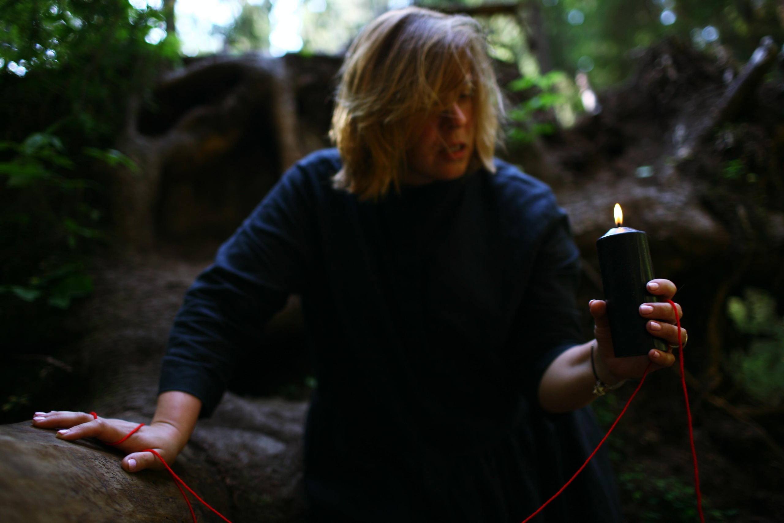 Anna, by herself. Woods and a little bit fire. Victoria Dini. Art photography in London / Folkestone, UK