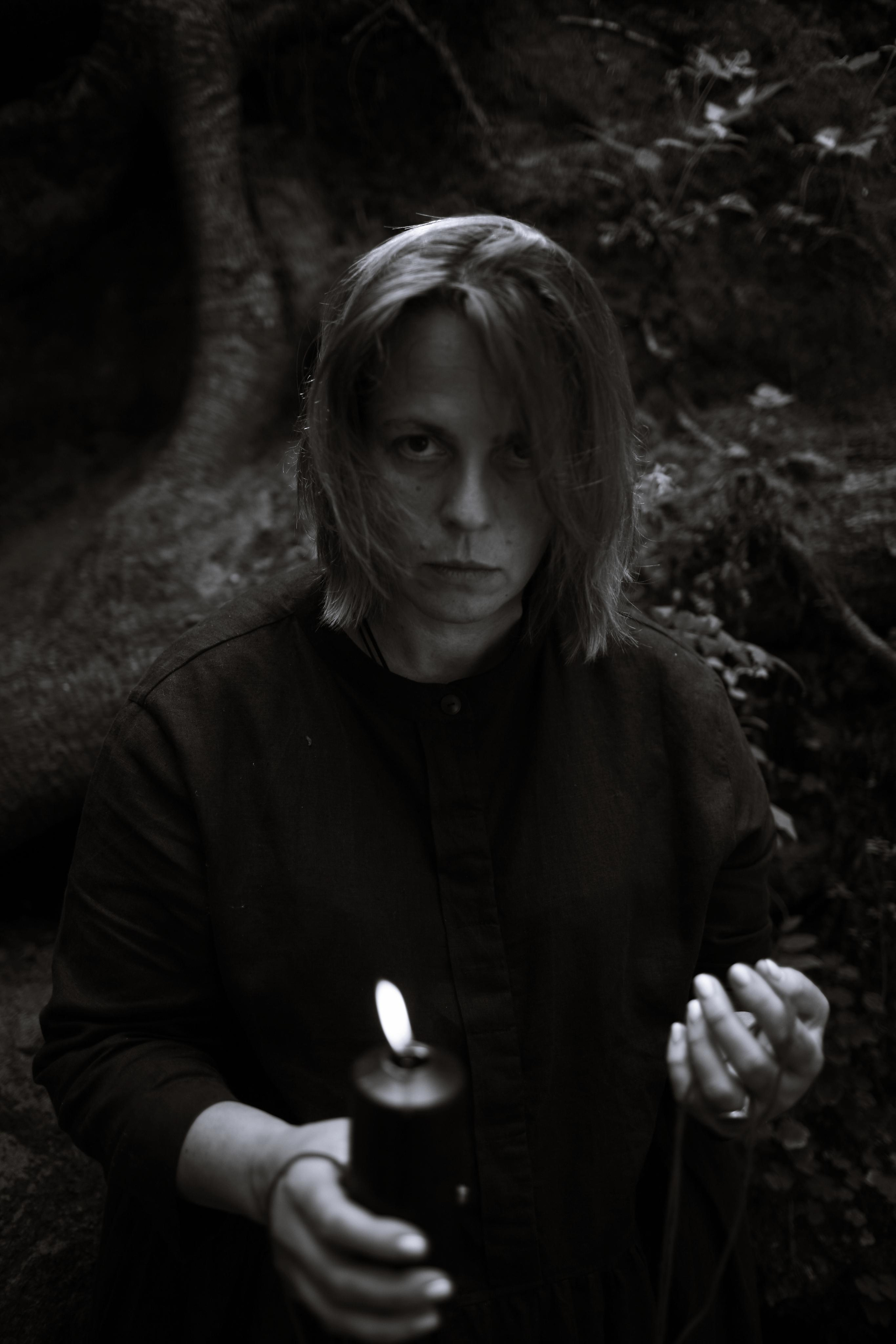 Anna, by herself. Woods and a little bit fire. Victoria Dini. Art photography in London / Folkestone, UK