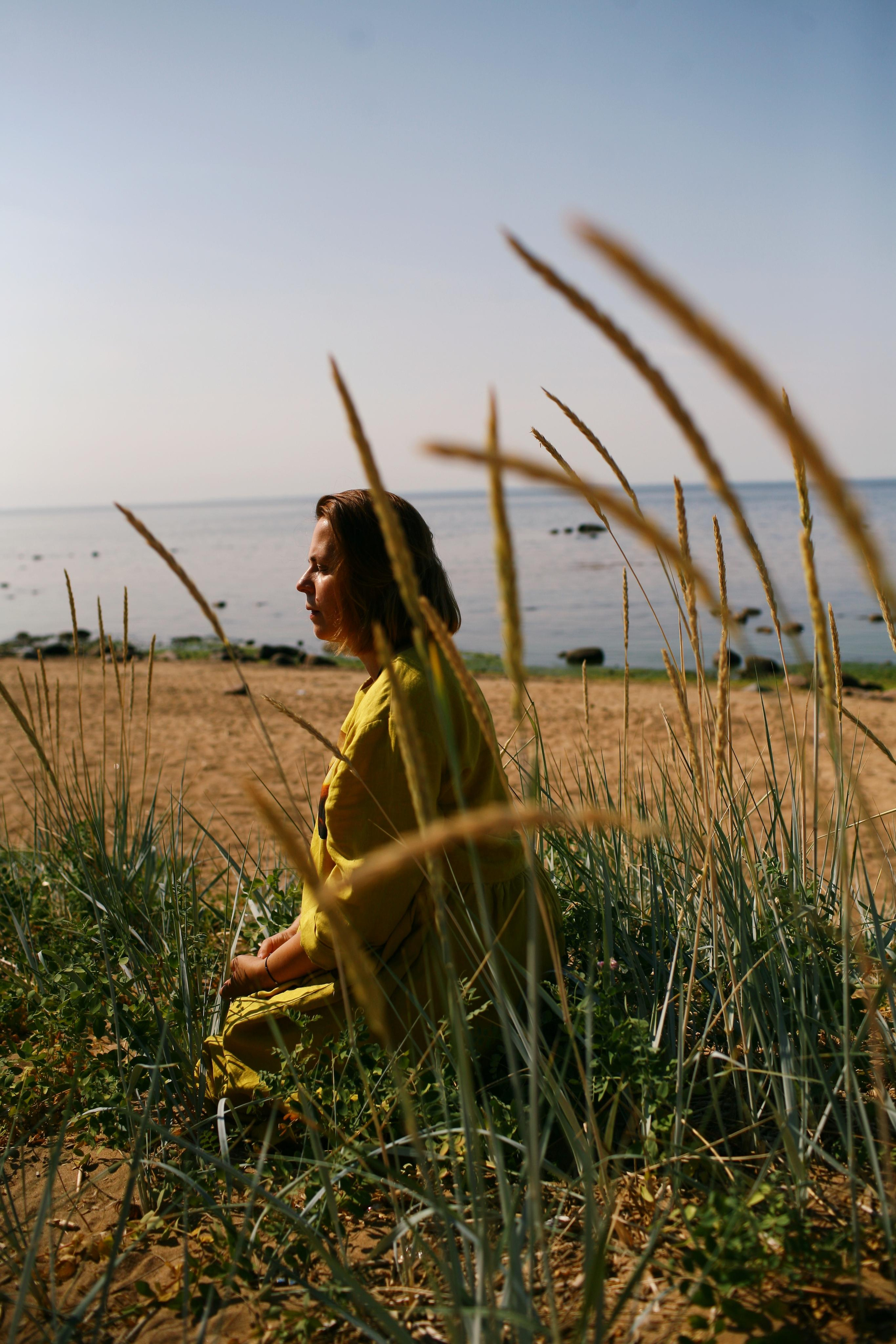 Anna, by herself. Stones and sand. Victoria Dini. Art photography in London / Folkestone, UK