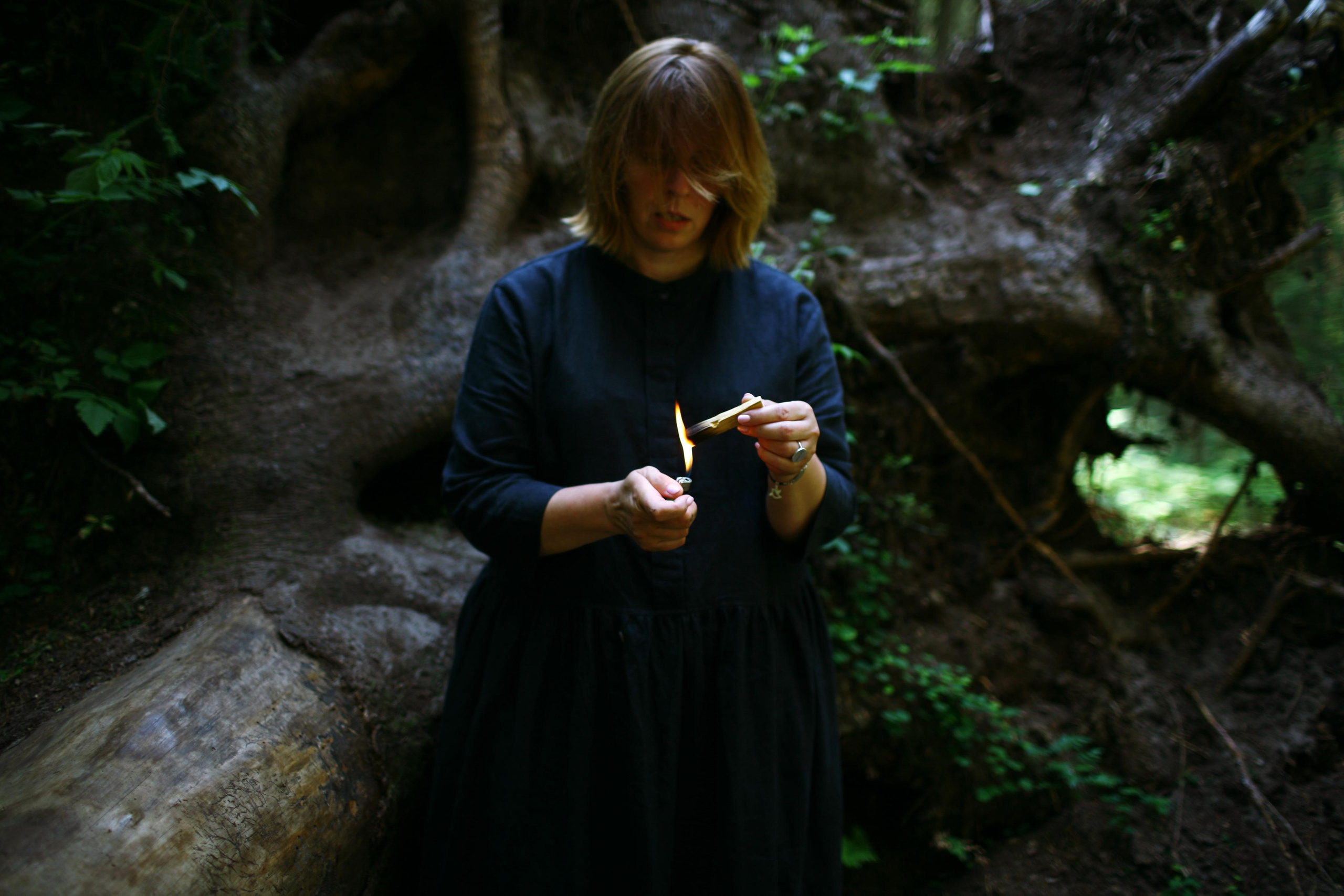 Anna, by herself. Woods and a little bit fire. Victoria Dini. Art photography in London / Folkestone, UK
