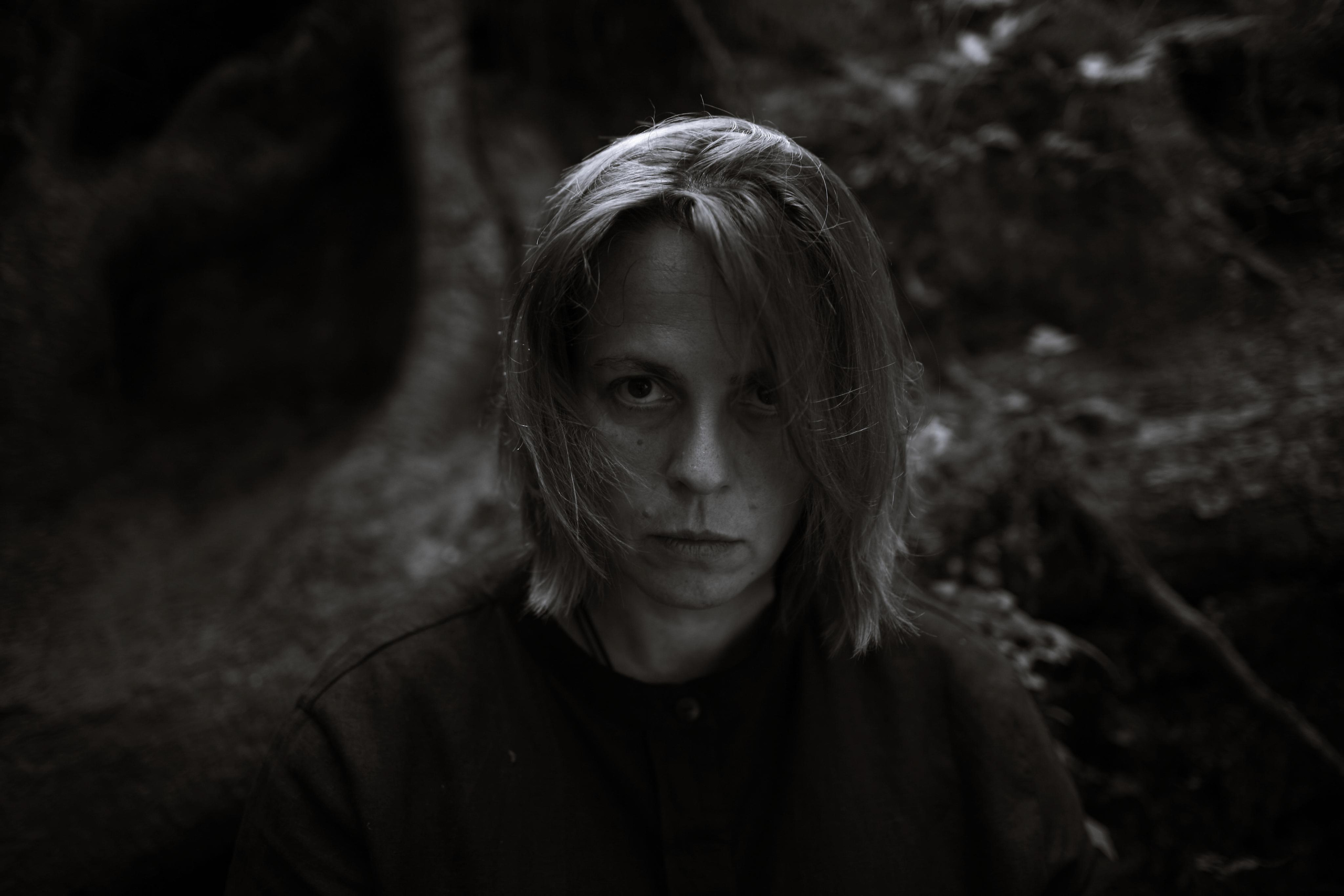 Anna, by herself. Woods and a little bit fire. Victoria Dini. Art photography in London / Folkestone, UK