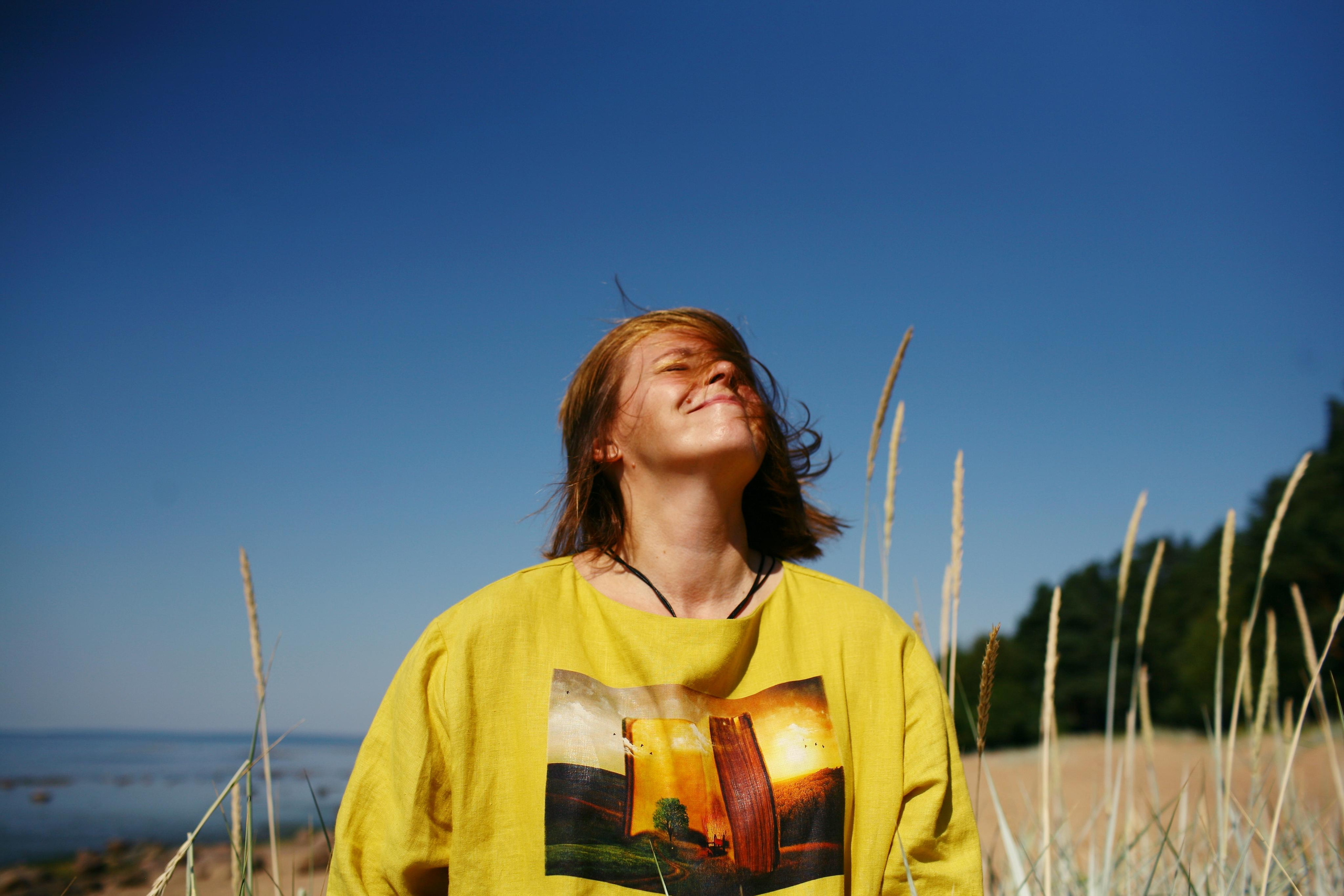 Anna, by herself. Stones and sand. Victoria Dini. Art photography in London / Folkestone, UK