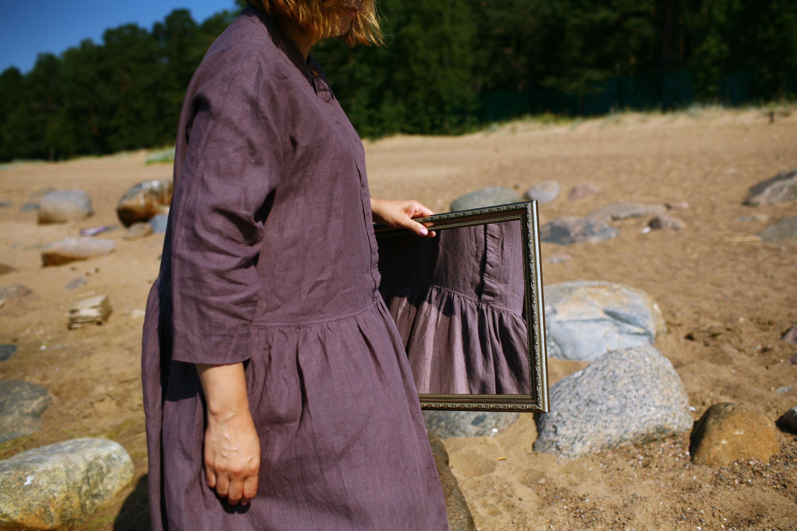 Anna, by herself. Stones and sand. Victoria Dini. Art photography in London / Folkestone, UK