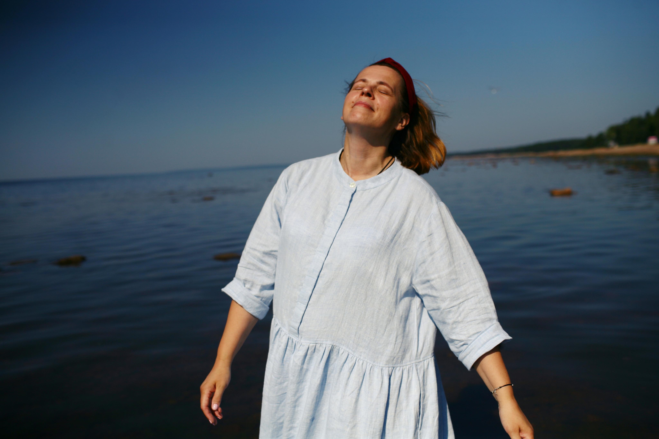 Anna, by herself. Stones and sand. Victoria Dini. Art photography in London / Folkestone, UK