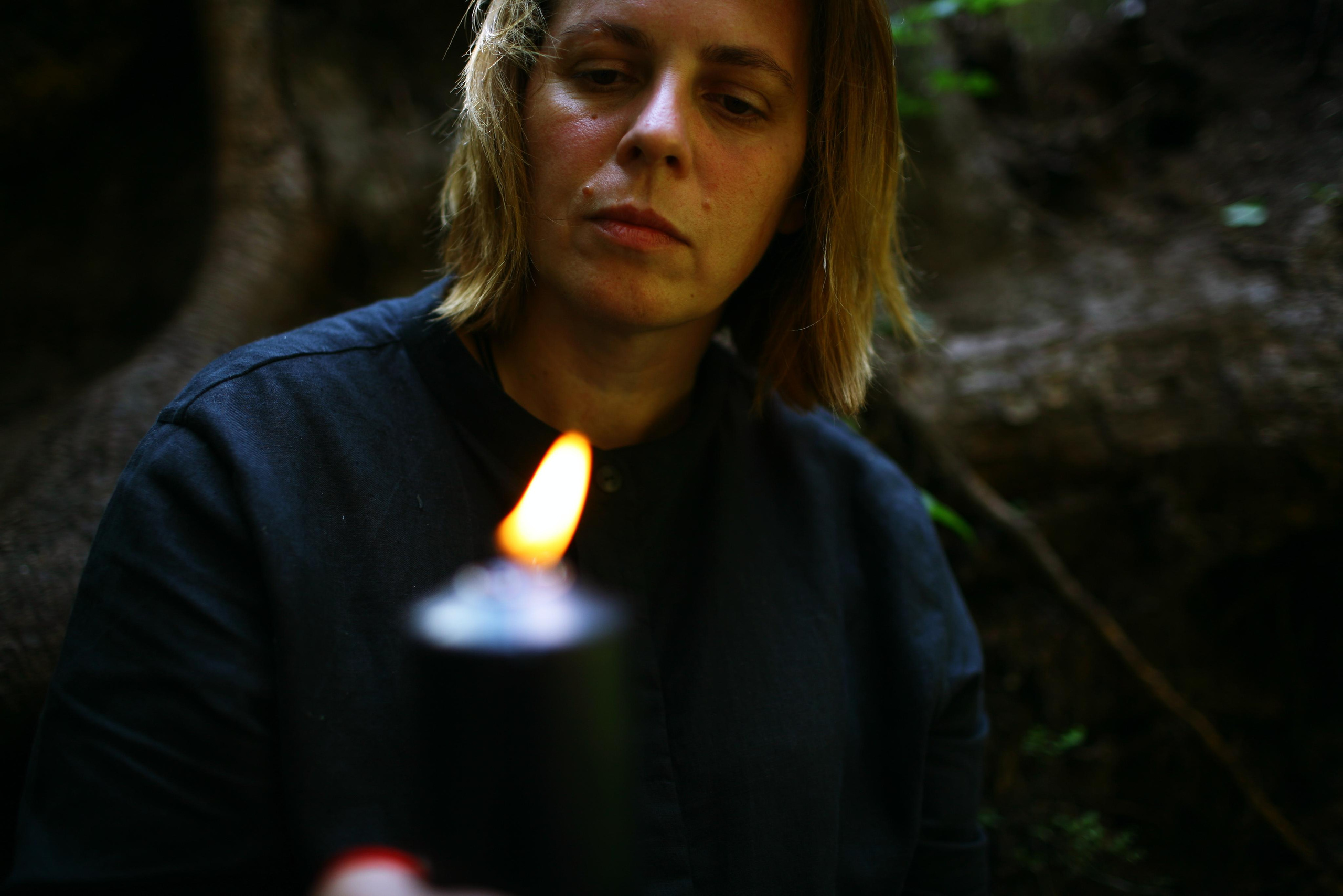 Anna, by herself. Woods and a little bit fire. Victoria Dini. Art photography in London / Folkestone, UK