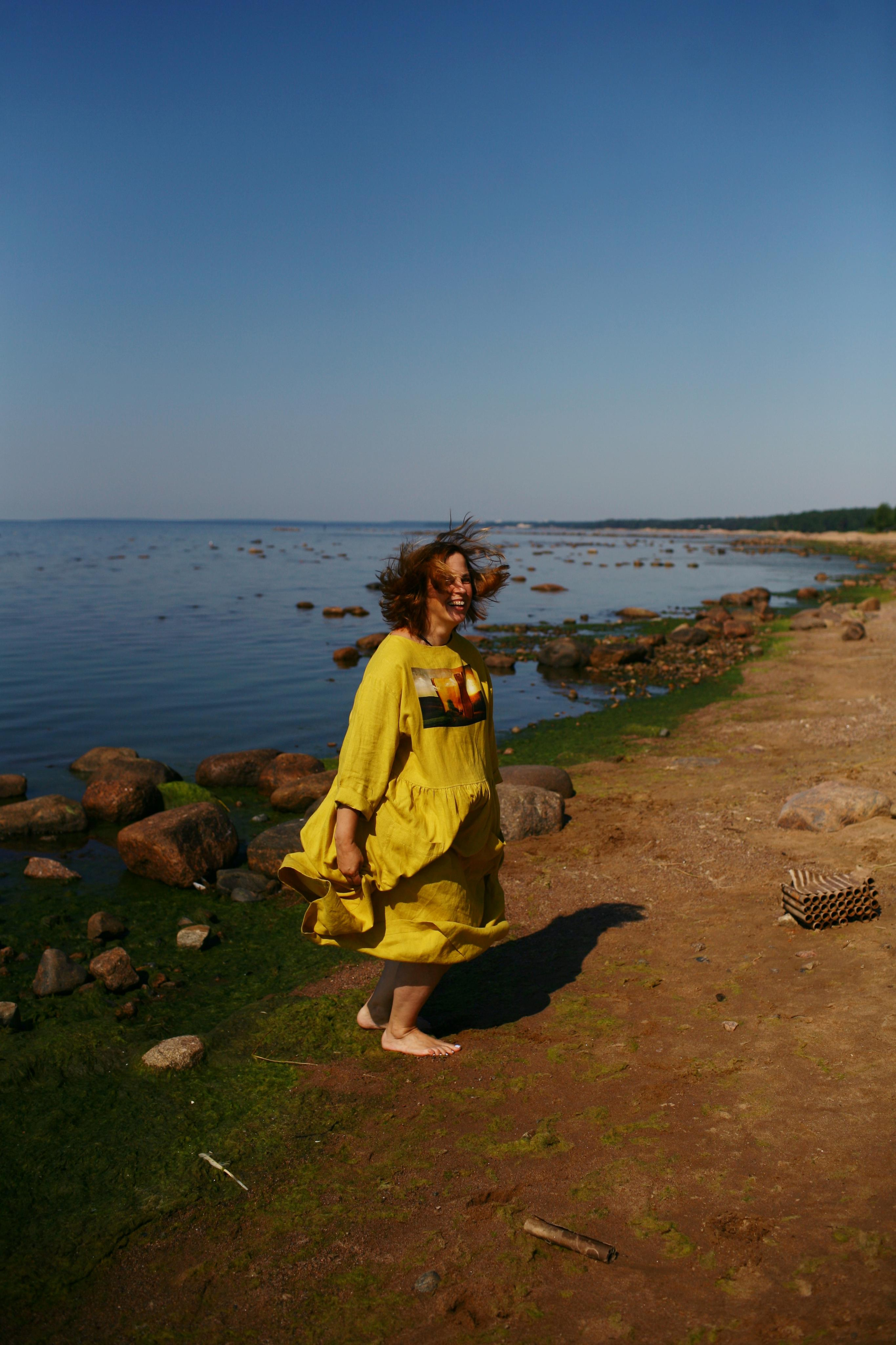 Anna, by herself. Stones and sand. Victoria Dini. Art photography in London / Folkestone, UK
