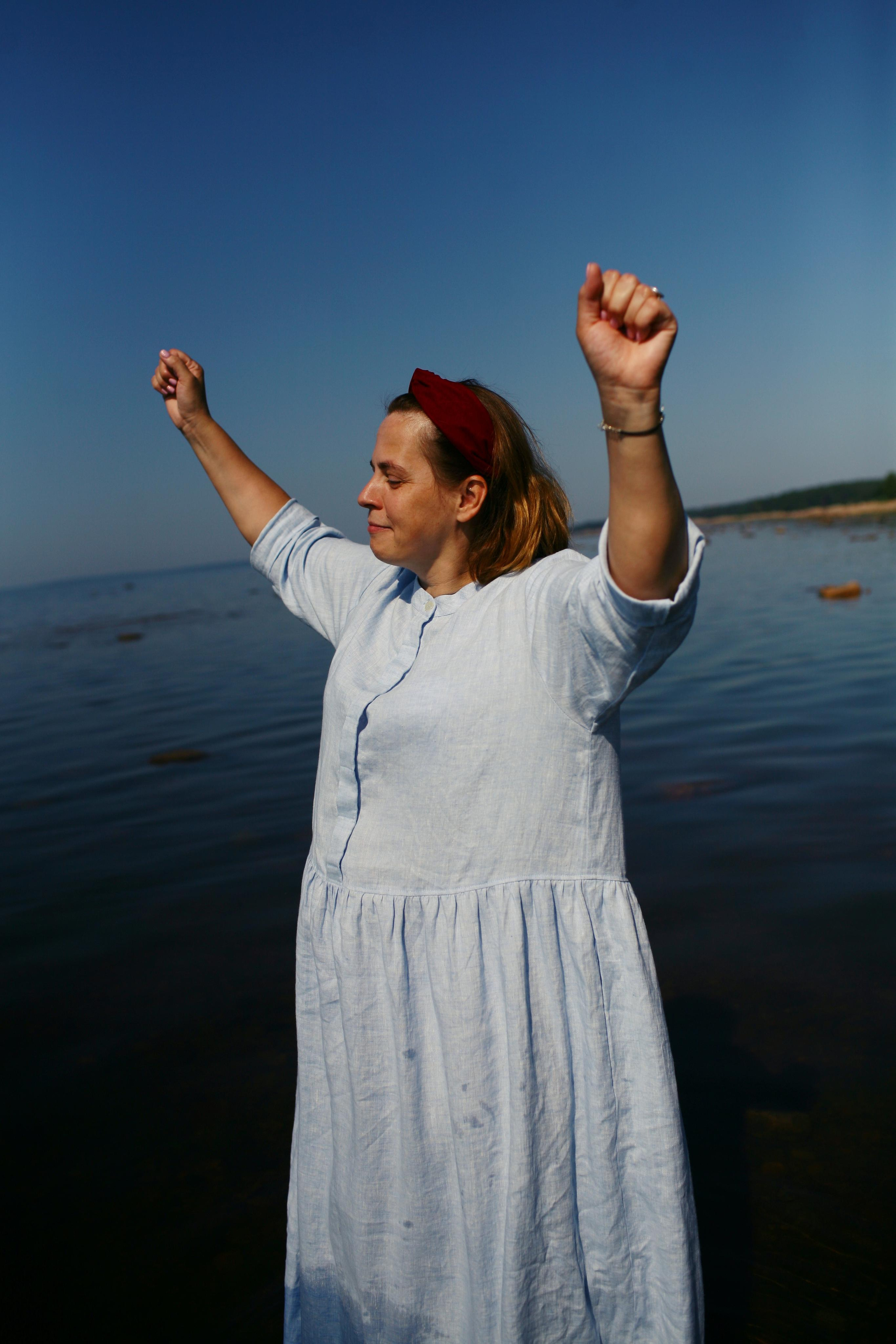 Anna, by herself. Stones and sand. Victoria Dini. Art photography in London / Folkestone, UK