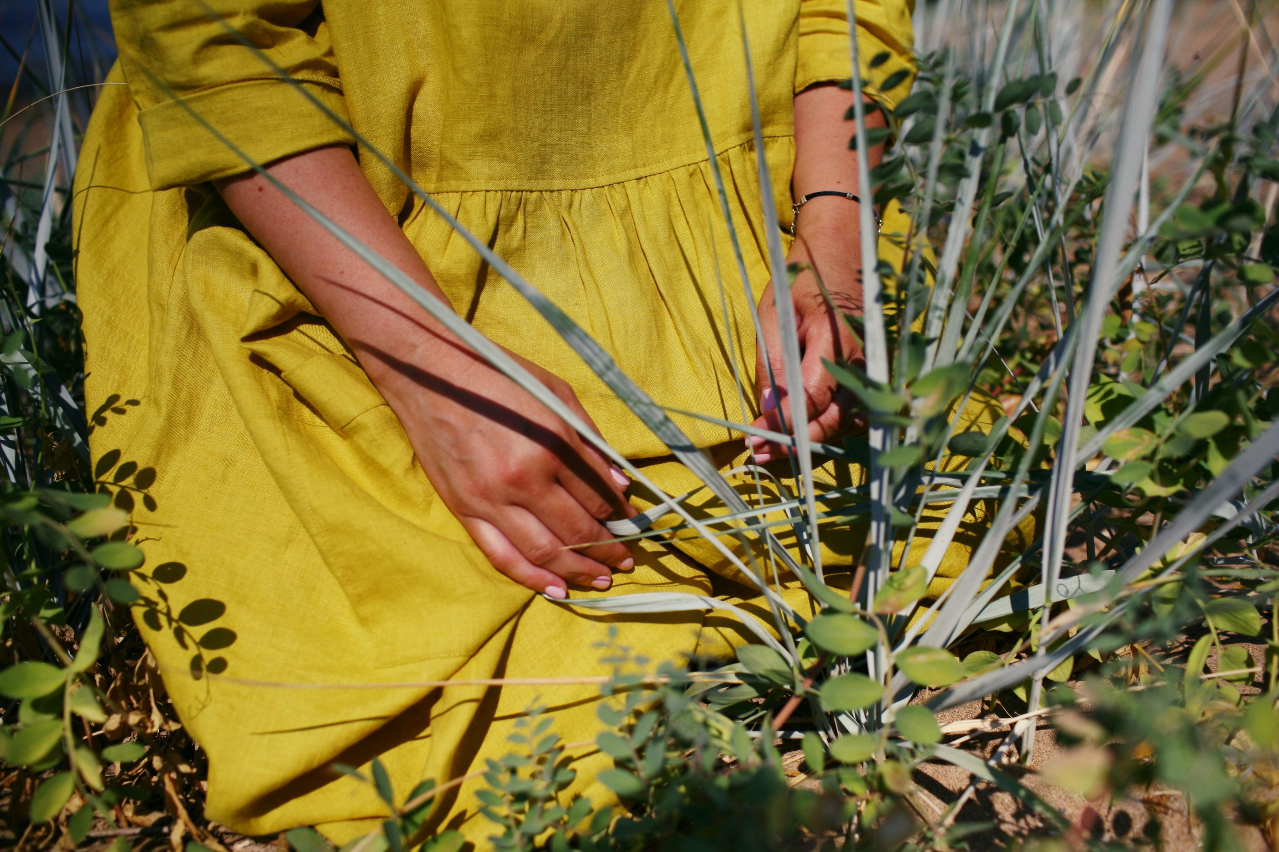 Anna, by herself. Stones and sand. Victoria Dini. Art photography in London / Folkestone, UK