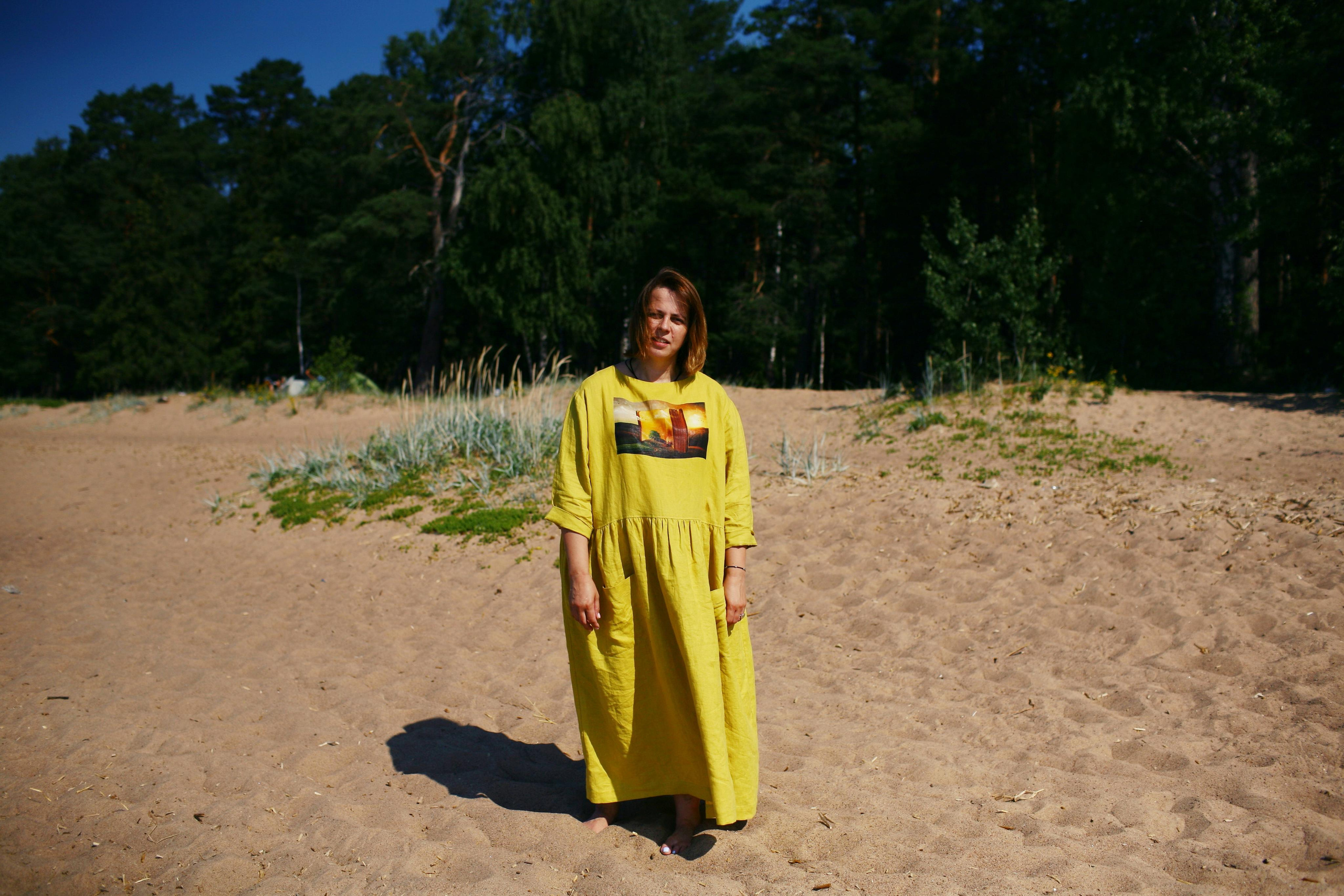 Anna, by herself. Stones and sand. Victoria Dini. Art photography in London / Folkestone, UK