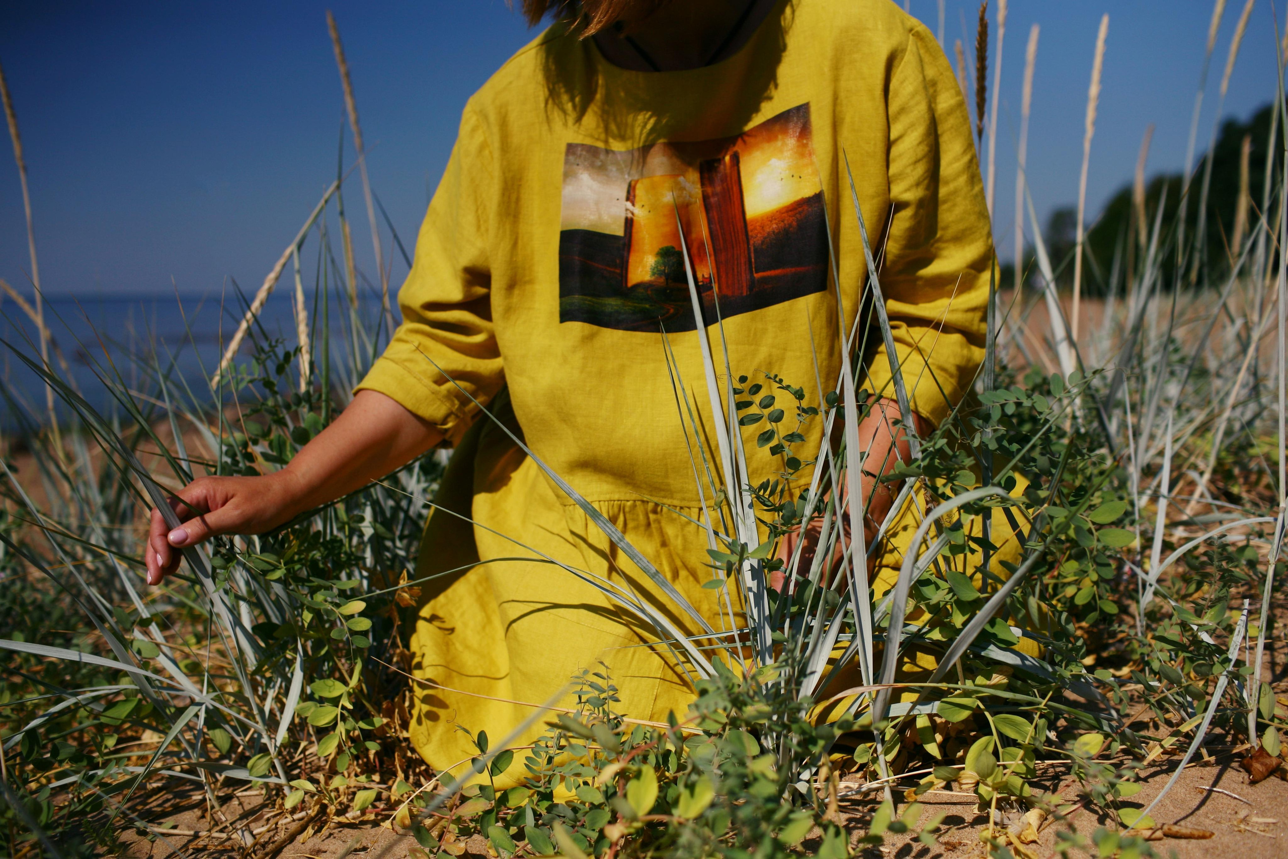Anna, by herself. Stones and sand. Victoria Dini. Art photography in London / Folkestone, UK